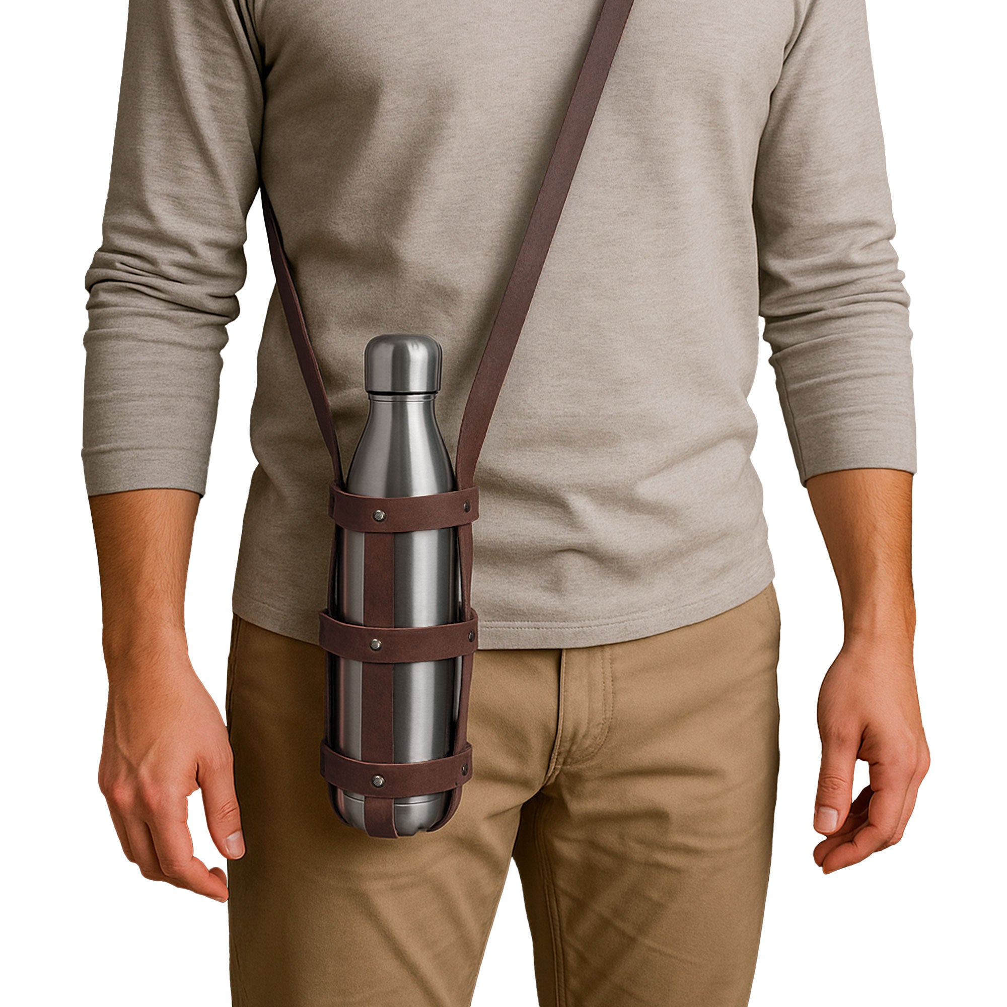 A model wearing the Hide & Drink Water Bottle Holder. This Rustic Leather Water Bottle Holder With Adjustable Strap offers a convenient way to carry your 2.5 in. diameter bottle. It's crafted from durable Full Grain Leather and hand sewn, reflecting artisanal quality. Ideal as a handmade carrier, this product is sourced from La Antigua Guatemala & Oaxaca Mexico.