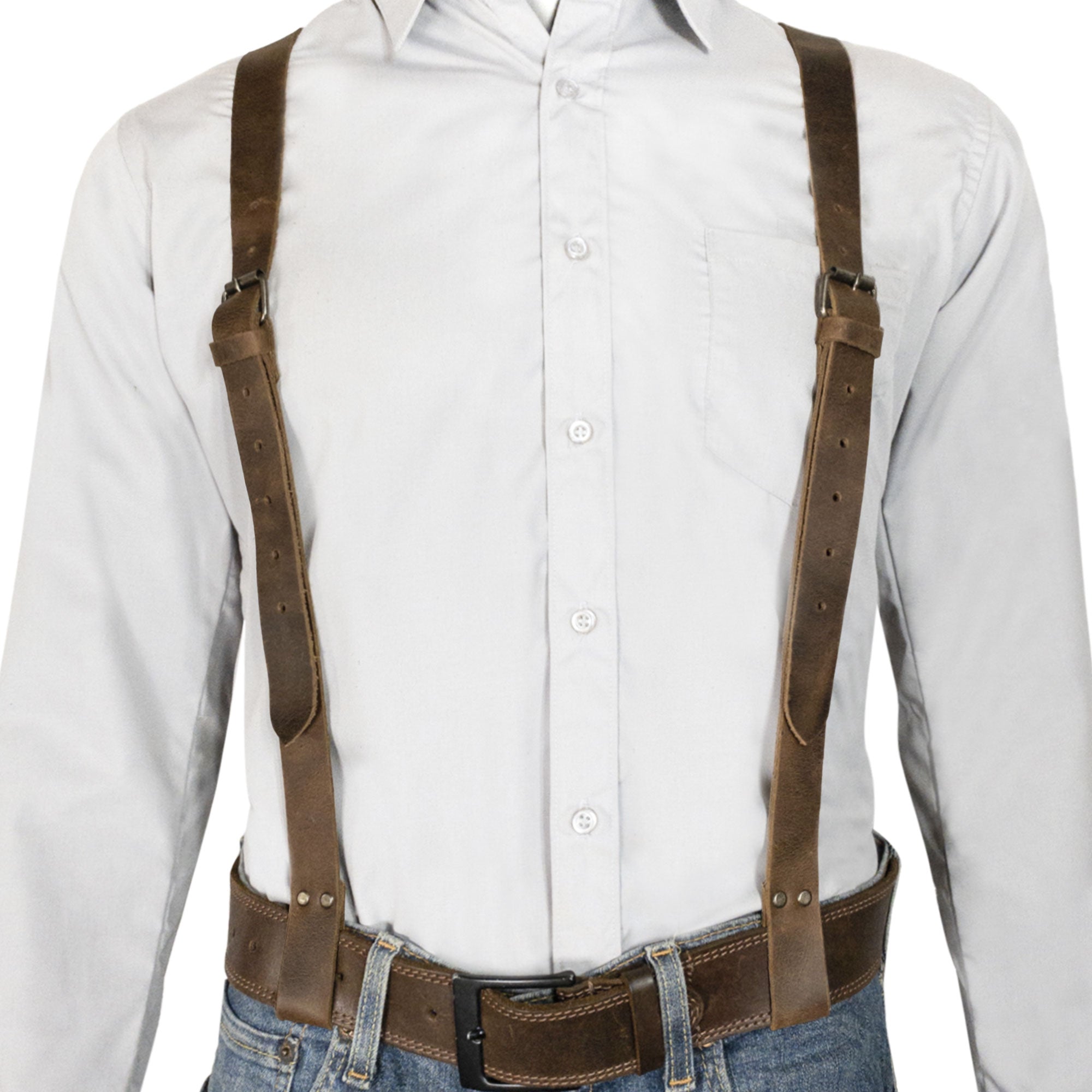 Hide & Groom's X Back Formal Suspenders with Belt Loops displayed on a model, perfect for enhancing formal attire for weddings and business meetings. Made from durable full grain leather, these adjustable suspenders are hand crafted in La Antigua Guatemala, emphasizing artisan quality and unique design.