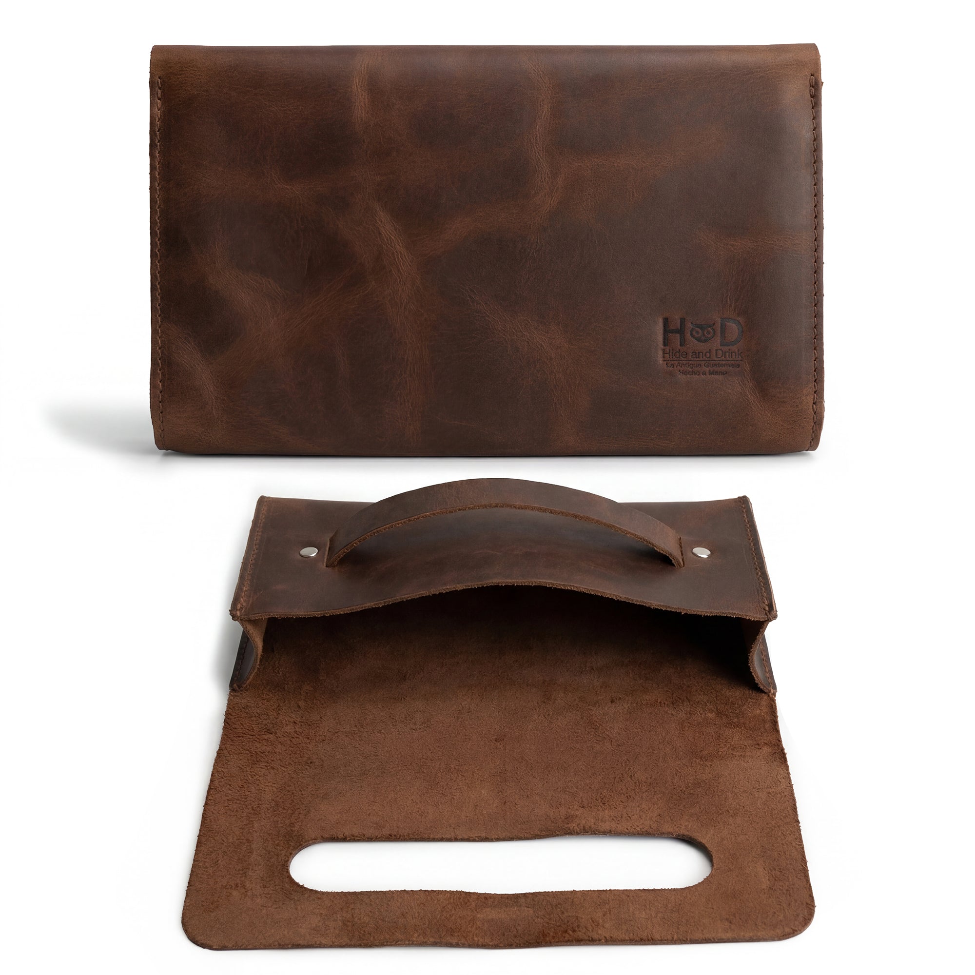 Open view of the Clutch Bag With Handle from Hide & Drink, demonstrating its functional design. This Full Grain Leather Clutch Bag with Handle is an elegant choice for women, a perfect handbag for girls and night bag for ladies, lovingly handmade in Guatemala and Mexico.