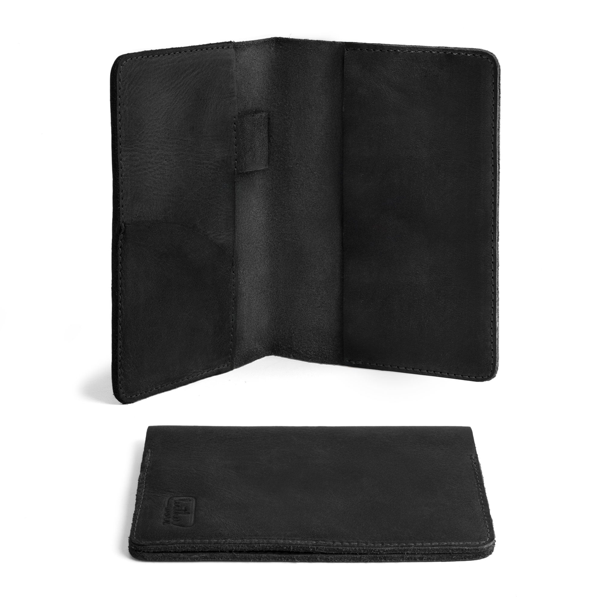Interior view of the black Field Notes Carrier by Leather Worx showcasing its features. This multifunctional Field Notes Cover serves as a Leather Notebook Cover 3.5 x 5.5 in. with dedicated spaces for a card and pen, making it the perfect travel companion. Artisan-crafted from full grain leather in La Antigua Guatemala, it underscores quality and practicality.
