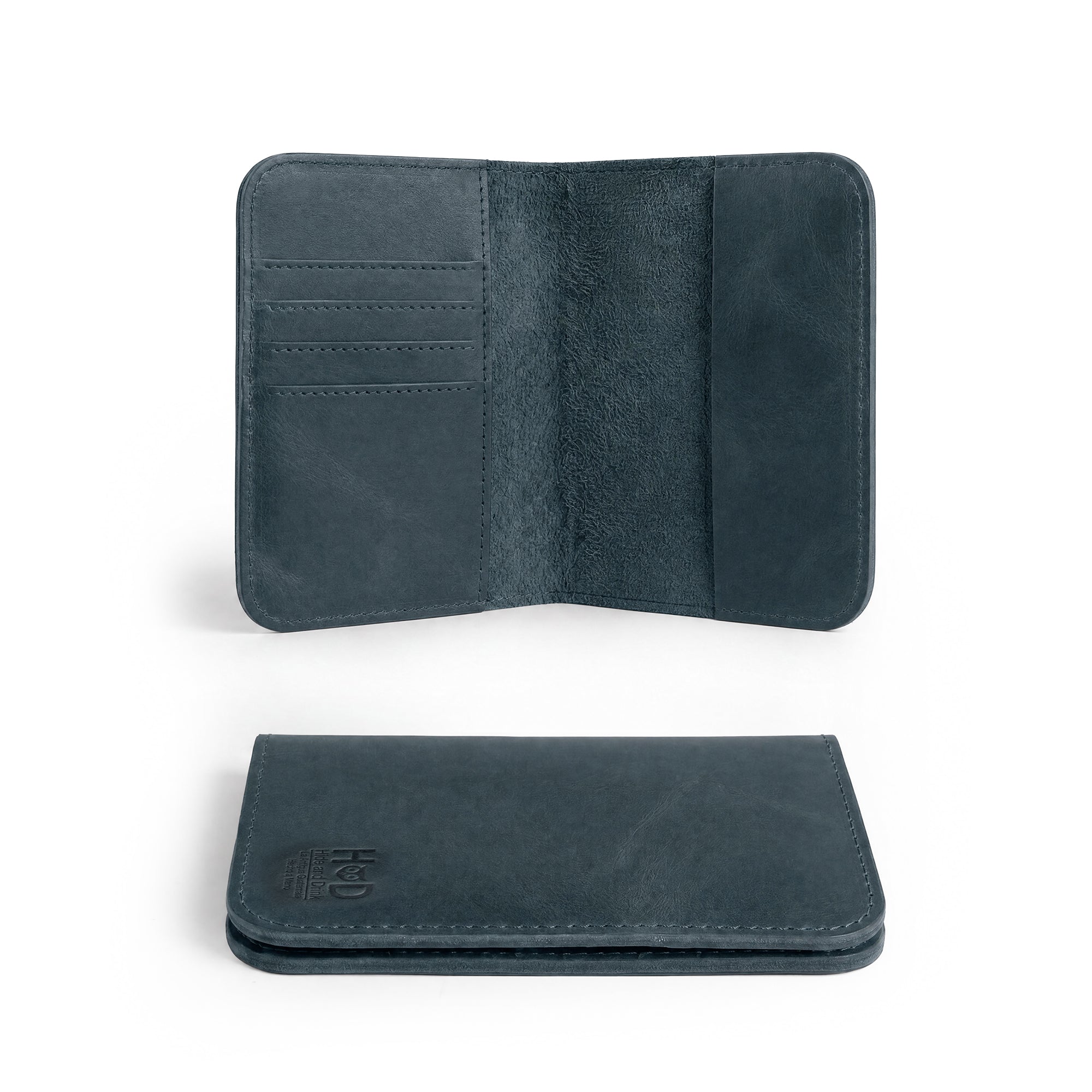 Close-up view of the Hide & Drink Travel Wallet demonstrating its construction quality. This artisan-crafted travel wallet acts as a bifold passport case, made from full grain leather in La Antigua Guatemala.
