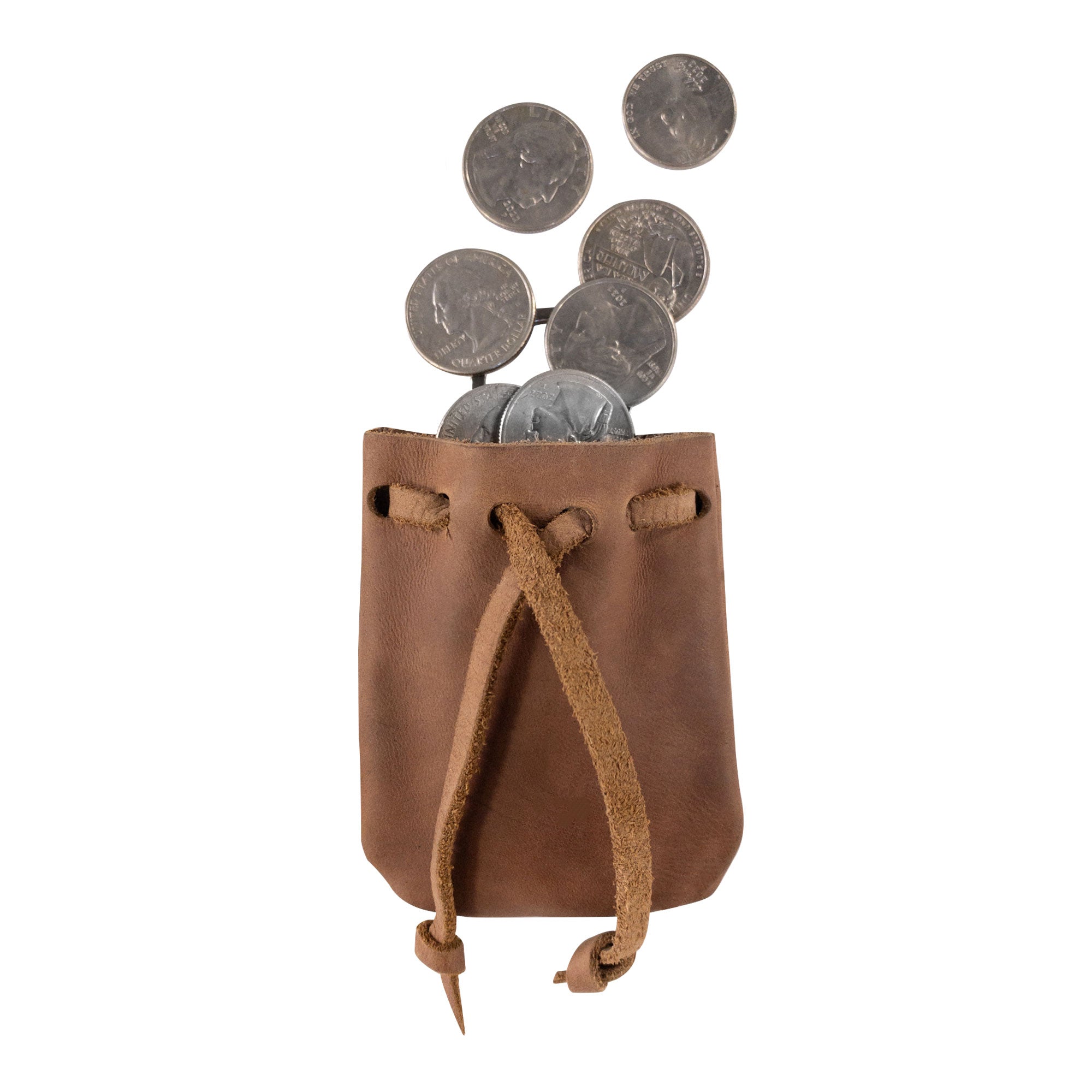 A Mini Medieval Pouch Keychain by Hide & Drink filled with coins, showcasing its practicality. This tiny bag with keyring doubles as a coin pouch, crafted with care from full grain leather, emphasizing the artisan nature of small batch production in La Antigua Guatemala.