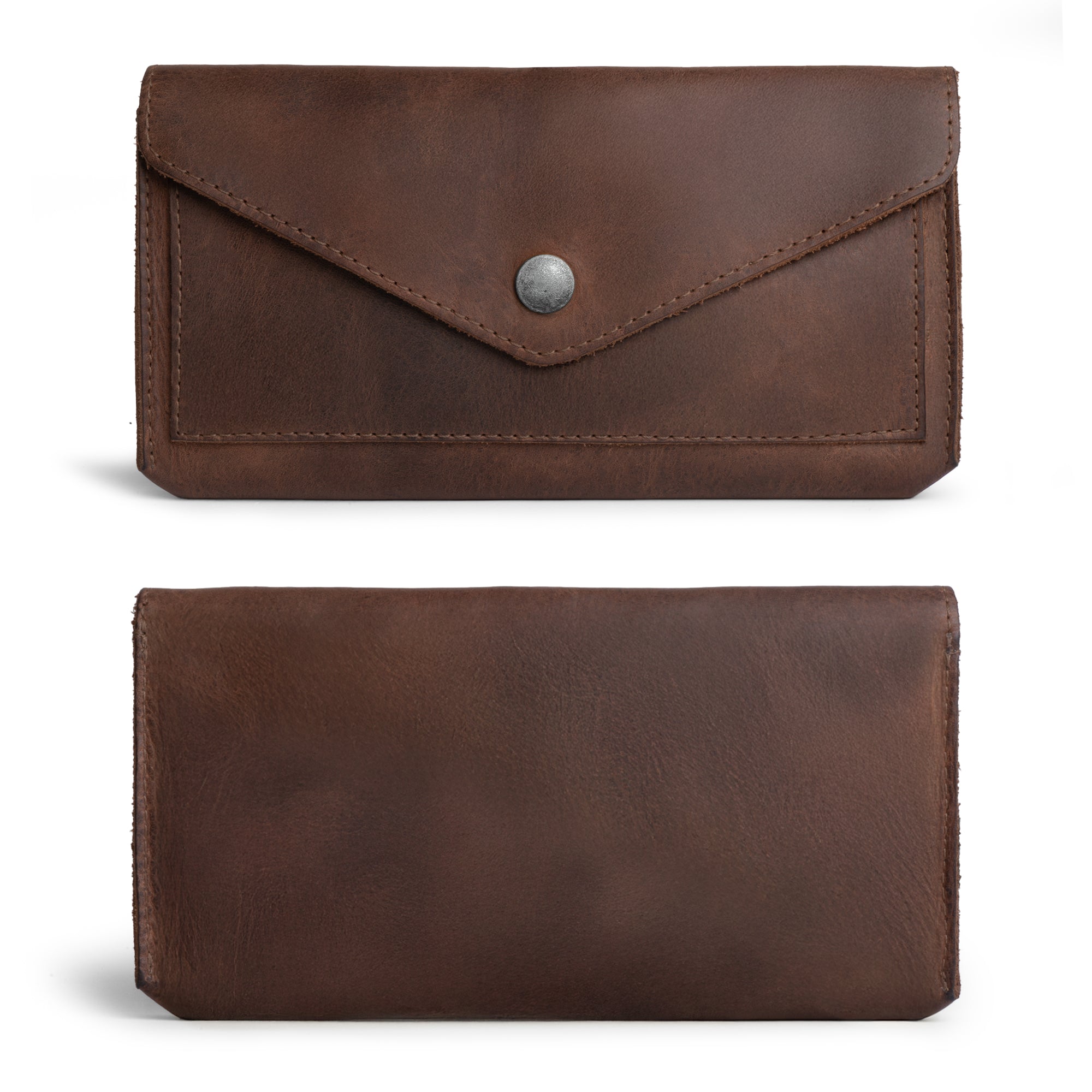 The exterior view of the Large Female Wallet by Hide & Drink, highlighting its vintage design and sturdy snap closure. As a Travel Organizer for Women, this Vintage Money and Card Holder is crafted from Full Grain Leather, embodying the essence of artisan quality through Small Batch Production techniques, and is handmade in La Antigua Guatemala & Oaxaca Mexico.