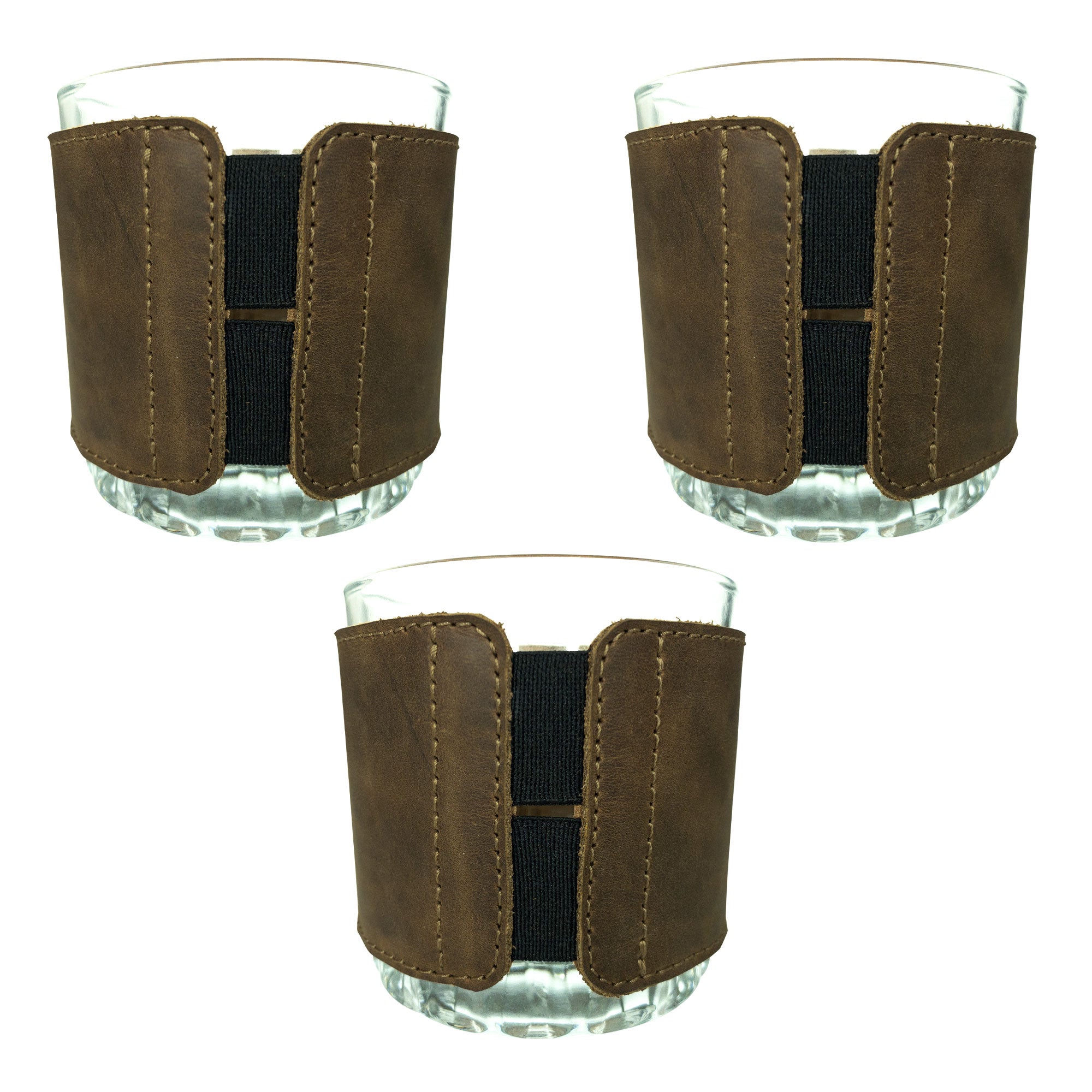 Set of 3 Drinking Glass Covers for Groomsmen by Hide & Groom, featuring a stylish design with a secure fit. These full grain leather covers are perfect for weddings and dinner parties, crafted with care through small batch production, hand cut, hand sewn, and fire branded in La Antigua Guatemala & Oaxaca Mexico.
