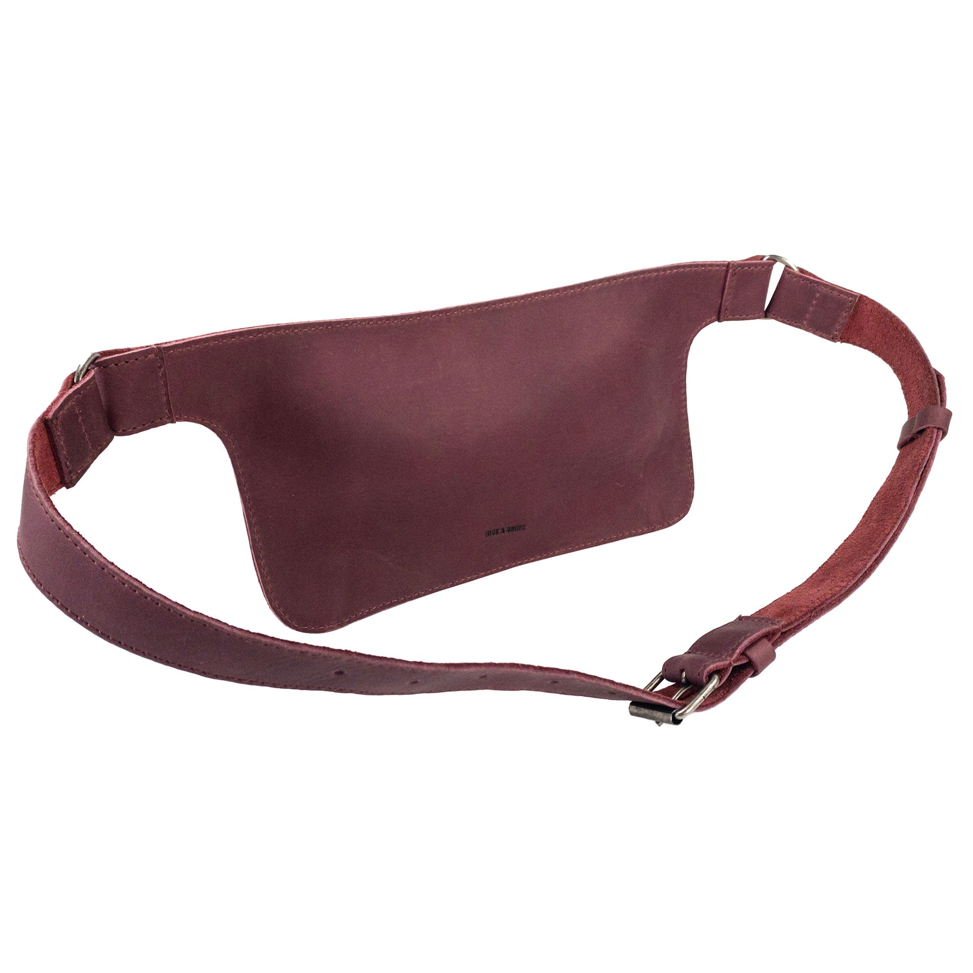 Slim Fanny Pack by Hide & Drink shown in profile, highlighting its sleek lines and practical design as a narrow waist bag. This artisan handbags made from full grain leather are crafted in La Antigua Guatemala.