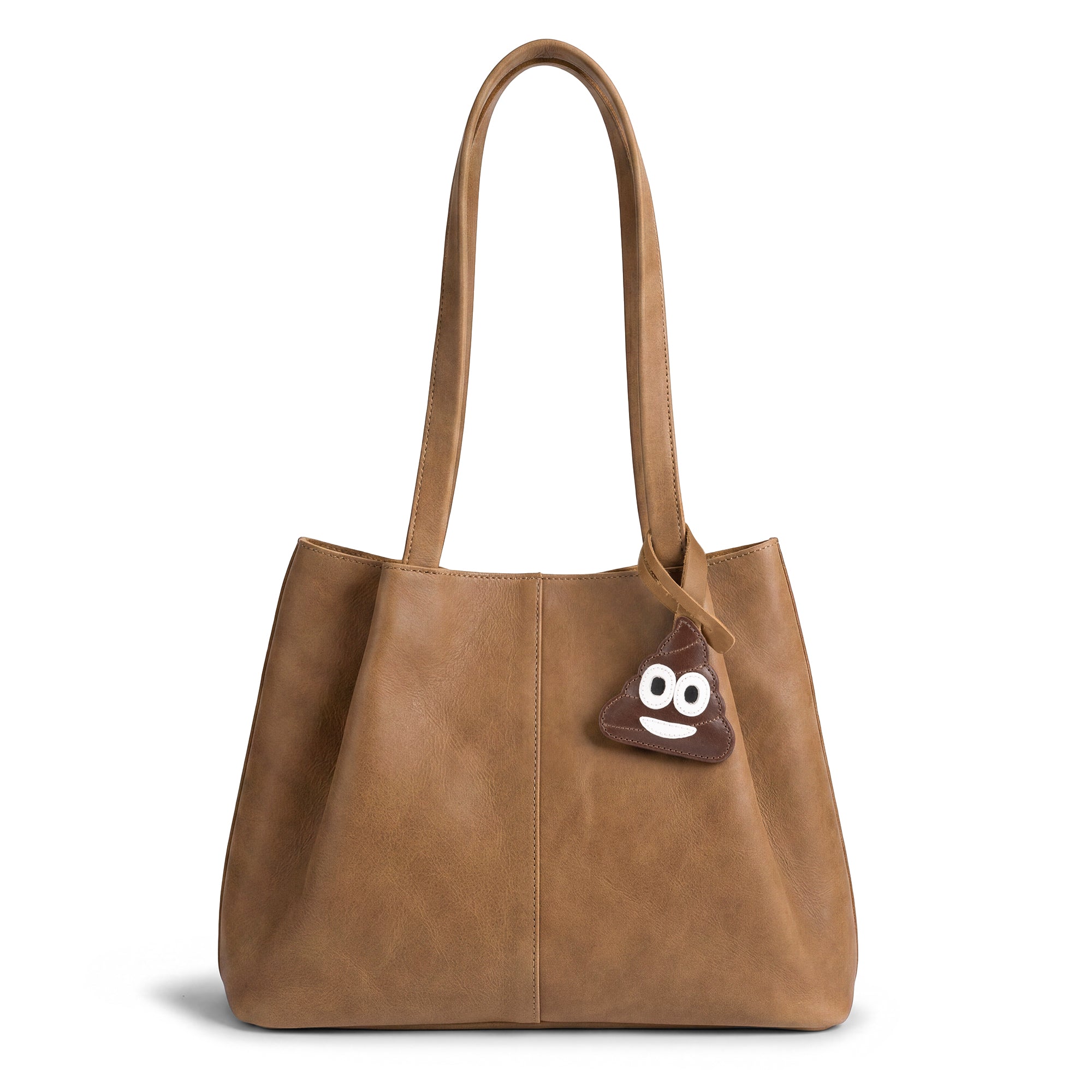Stylish tote bag showcasing the Poop Emoji Bag Charm by Hide & Drink, an ideal accessory for adding a playful touch to your handbag, purse, or backpack. Crafted from full grain leather, this charm represents small batch production, fire branded artistry, and the handmade tradition of La Antigua Guatemala and Oaxaca Mexico.