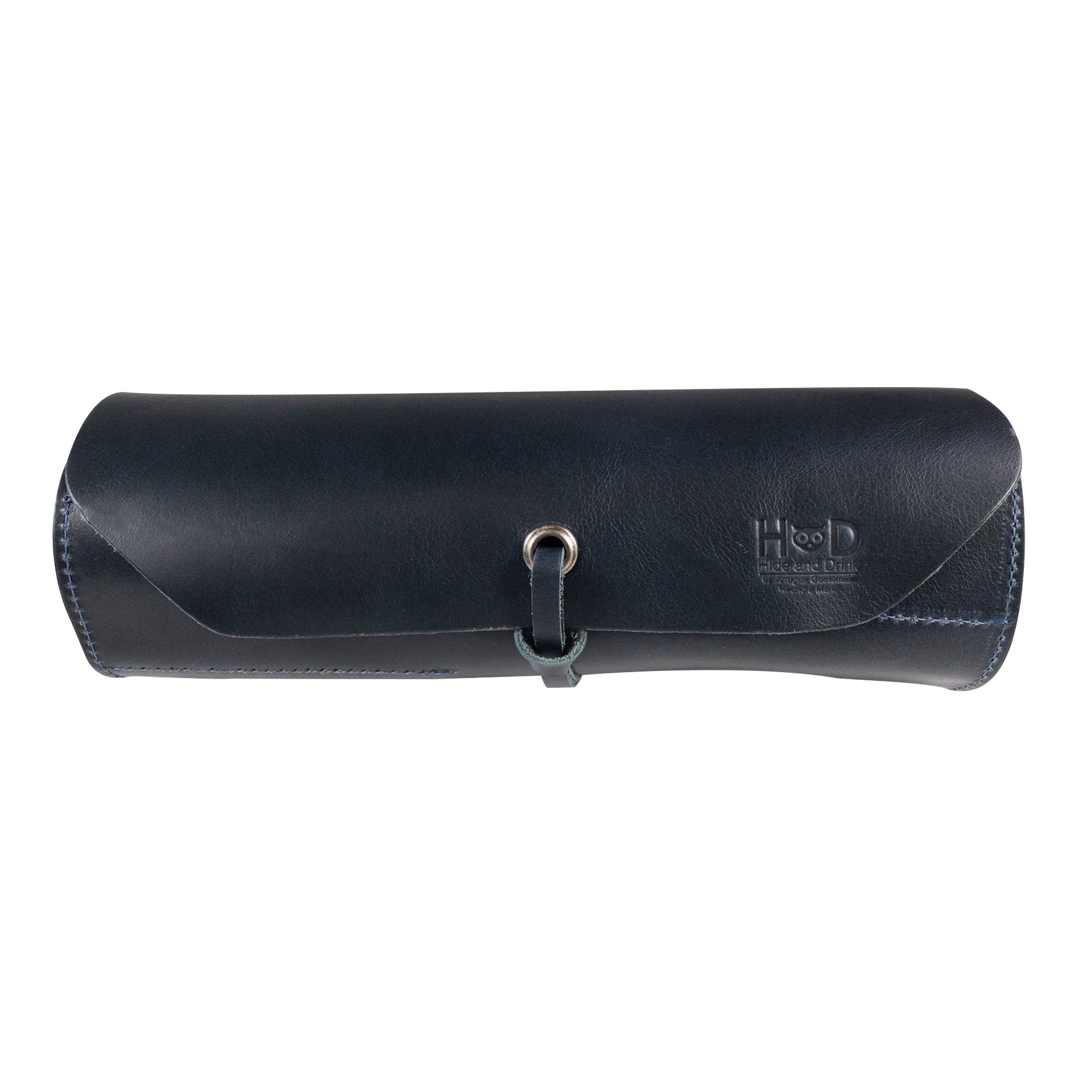Hide & Drink Tool Roll features a practical small tool roll-up bag with 10 slots, made from high-quality full grain leather. Ideal as a portable carry-on pouch for organizing woodworking tools, it enhances any workshop storage space. Every item is handmade in La Antigua Guatemala & Oaxaca Mexico, emphasizing craftsmanship.