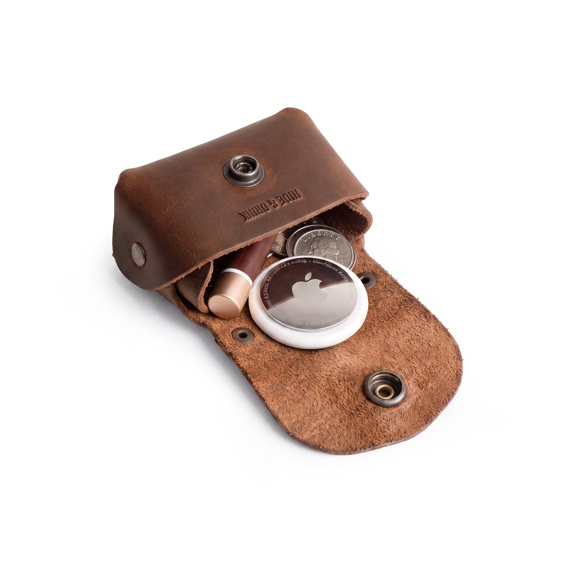 Tiny Handbag Keychain featuring a rustic design with key ring holder, crafted from full grain leather by Hide & Drink. This artisan-made Tiny Handbag with Key Ring Holder, Full Grain Leather, showcases small batch production, hand cut, hand sewn, and fire branded techniques, handmade in La Antigua Guatemala & Oaxaca Mexico.