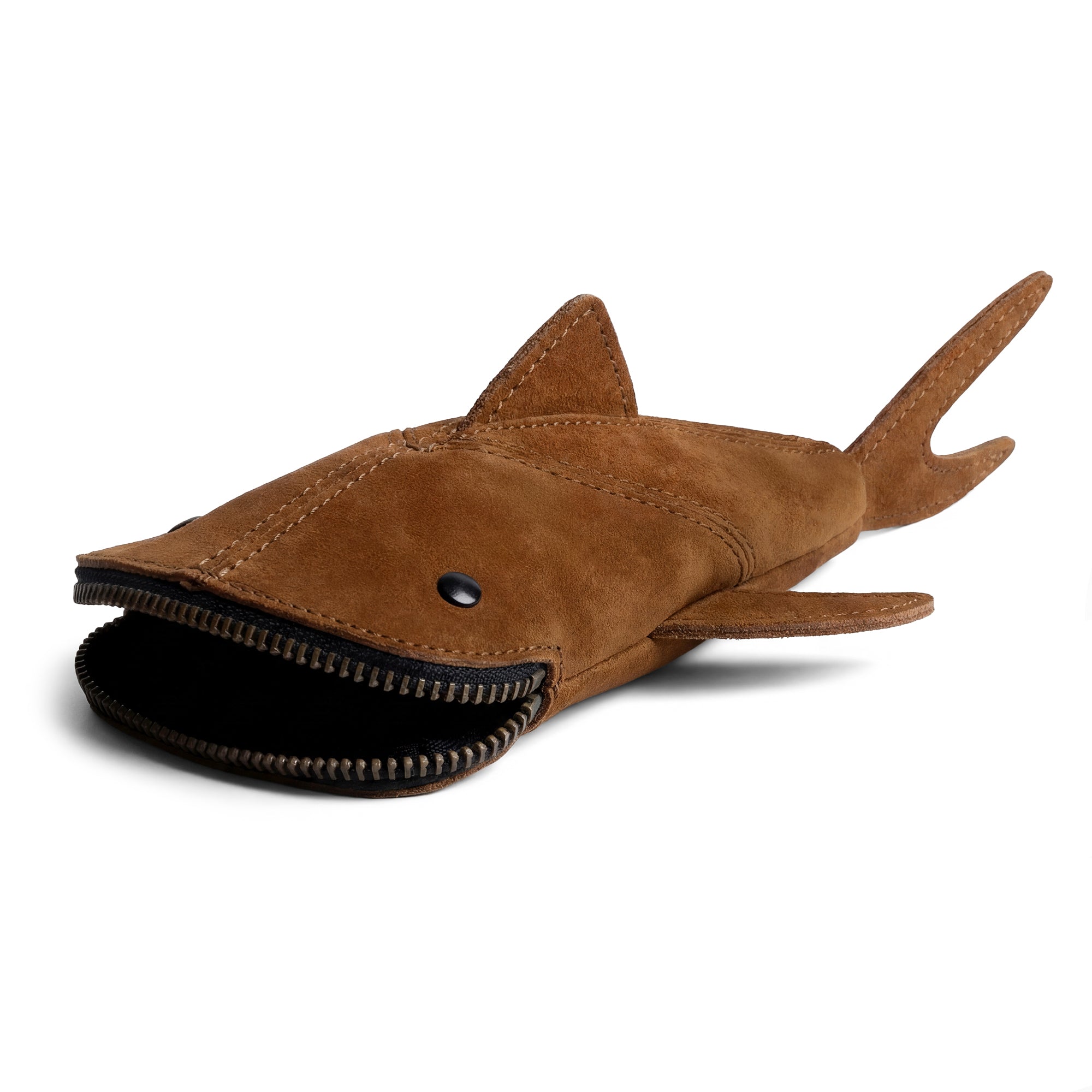 Side view of the Hide & Drink Leather Shark Pouch, featuring a sleek design made of full grain leather, ideal as a scissors case or shark shaped cable holder, emphasizing handmade craftsmanship.