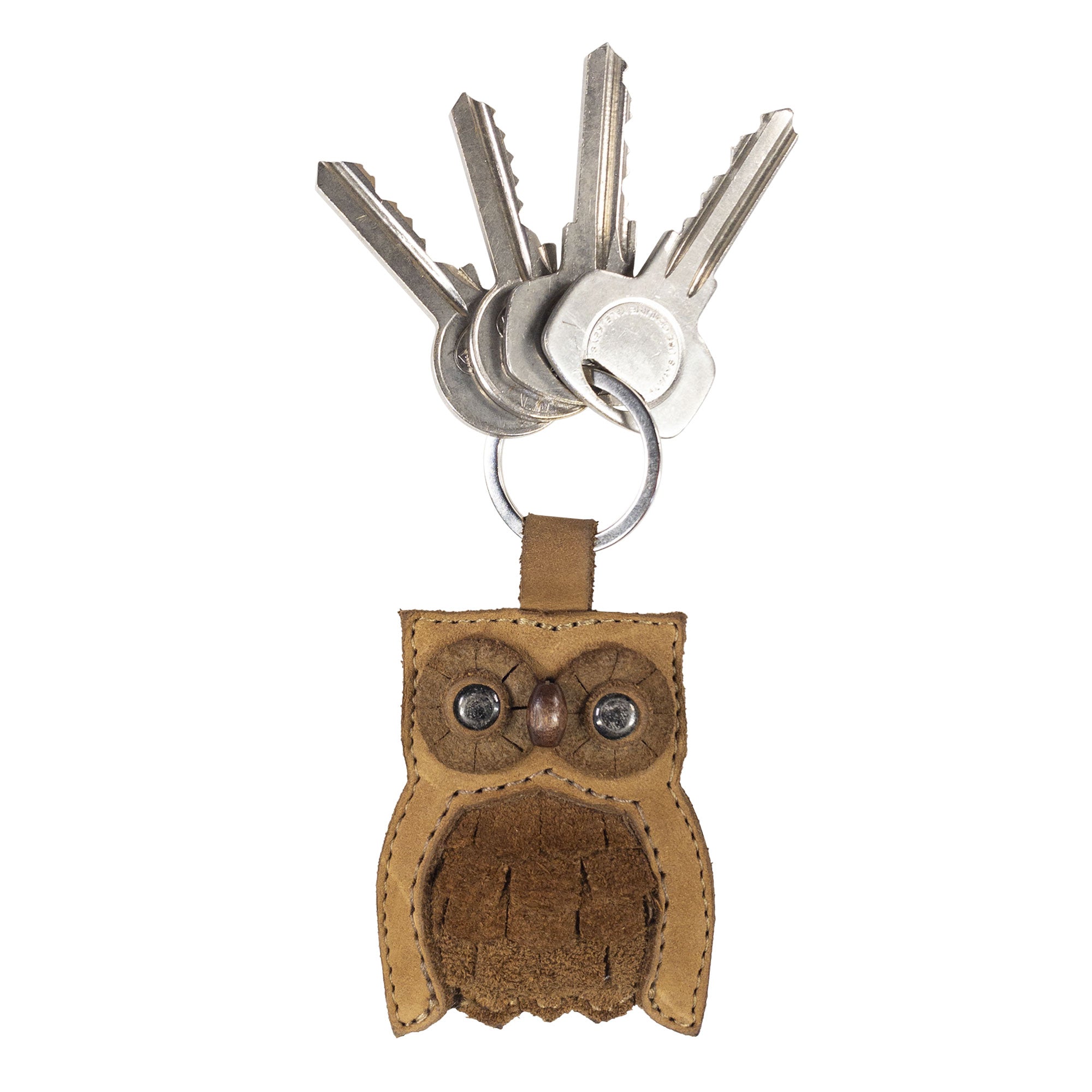 Close-up of the owl Critter Key Chain from Hide & Drink, showcasing its intricate stitching and details. This cute Animal Key Ring Holder is made from quality Full Grain Leather, perfect for organizing keys. Handmade in La Antigua Guatemala & Oaxaca Mexico.