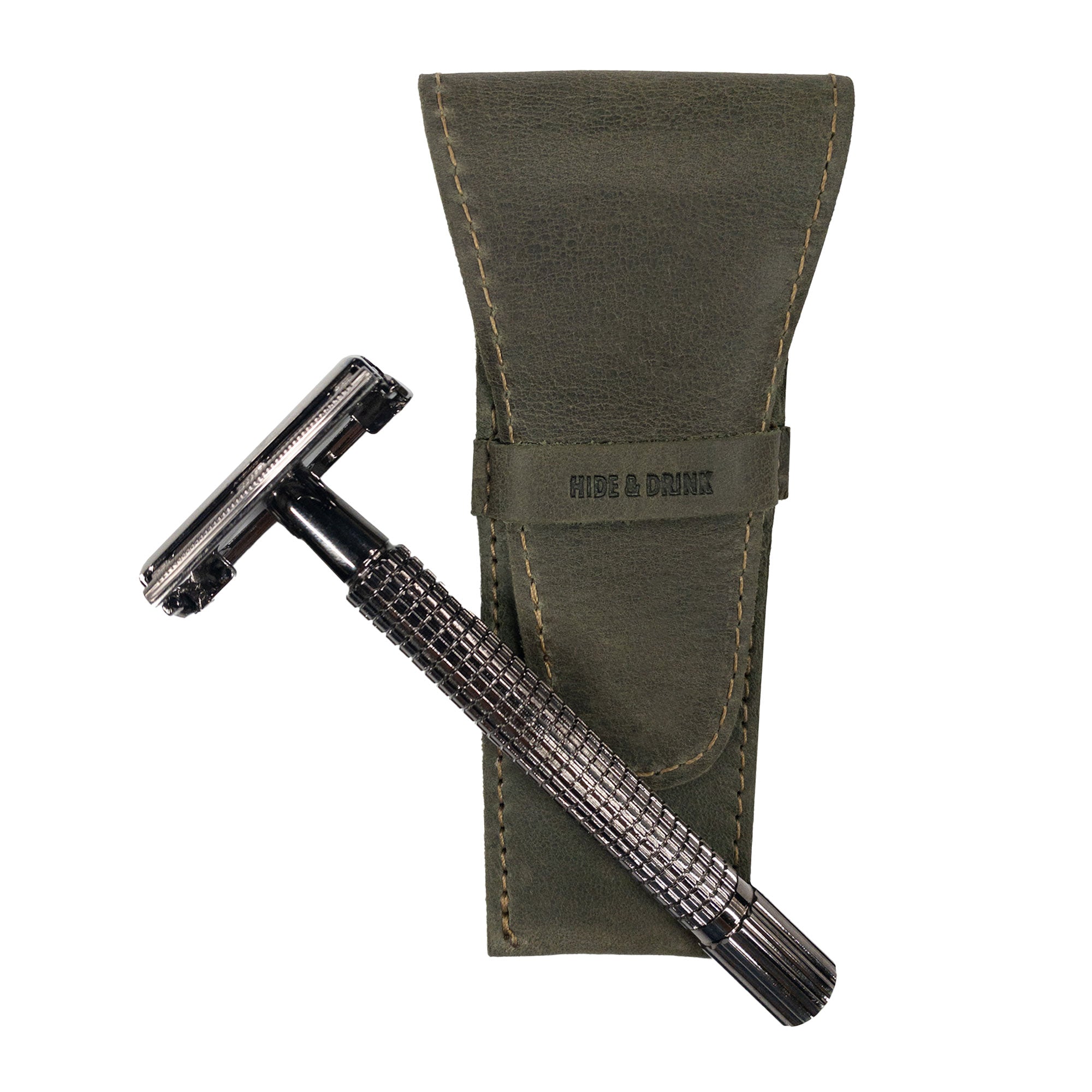 Hide & Drink Safety Razor Case in green with a razor inside, showcasing the unique design and premium Full Grain Leather of this personal care item.