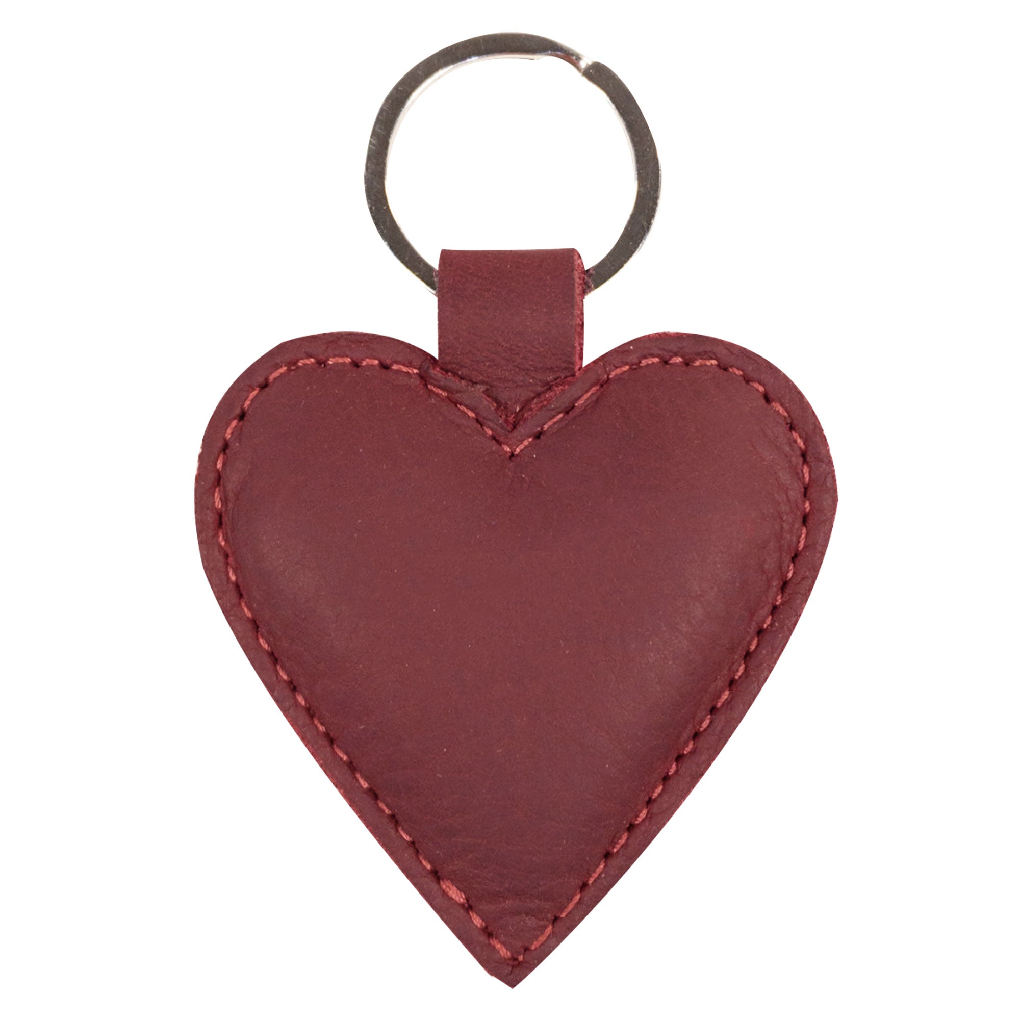 The front of a Heart Keychain by Hide & Drink, highlighting its beautiful heart-shaped design. This small batch produced keyring holder is made from high-quality Full Grain Leather, ensuring durability and style. Handmade in La Antigua Guatemala & Oaxaca Mexico, this cute accessory is perfect for organizing your keys with flair.
