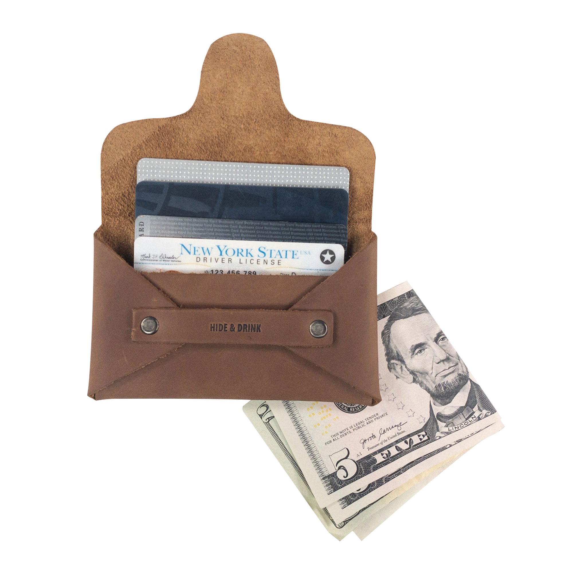 Hide & Drink's Snapless Business Card Holder presents a versatile vintage wallet for men and women. This sturdy pouch crafted from Full Grain Leather serves as an excellent money organizer, demonstrating the brand's dedication to artisan production in La Antigua Guatemala & Oaxaca Mexico.