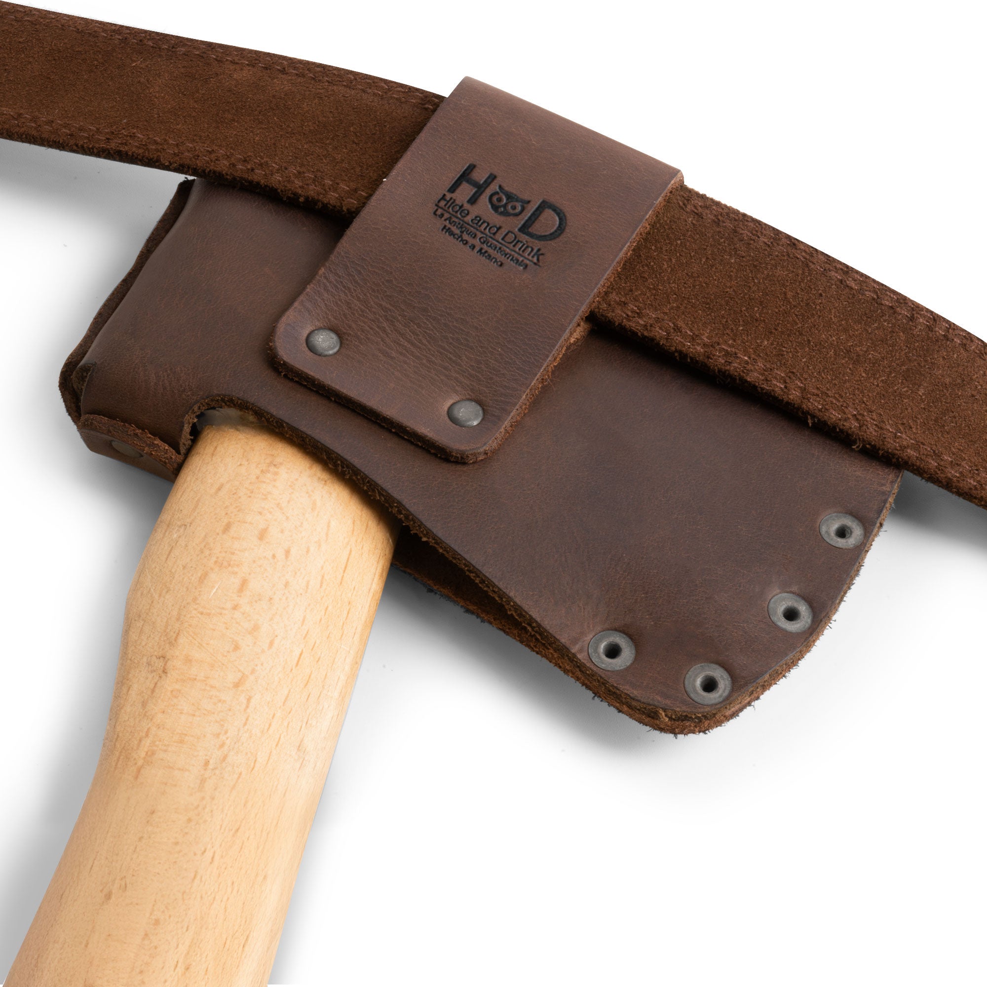 Hide & Drink Hatchet Head Sheath displayed with premium craftsmanship in full grain leather, this artisan blade cover and axe head case is not only functional but stylish for lumberjack outdoors work essentials. Handmade in La Antigua Guatemala & Oaxaca Mexico.