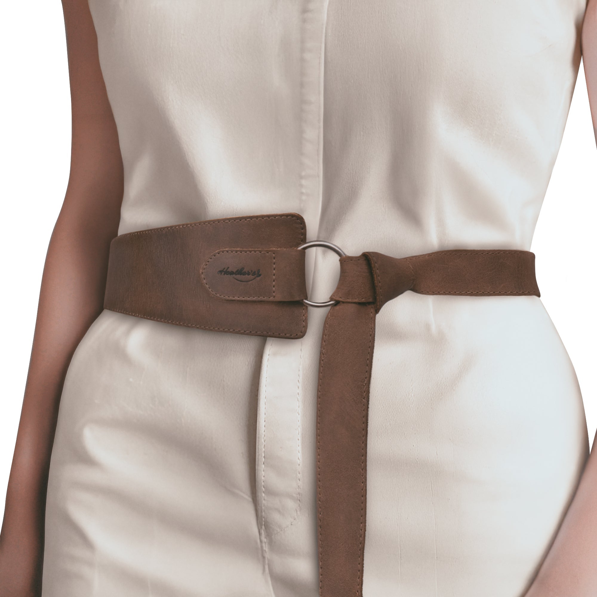 Model wearing Heather's Formal Belt for Women with Ring, demonstrating its versatility as a belly accessory. Made from luxurious Full Grain Leather, this No-Buckle Belt is handcrafted by artisans in La Antigua Guatemala, showcasing small batch production techniques.