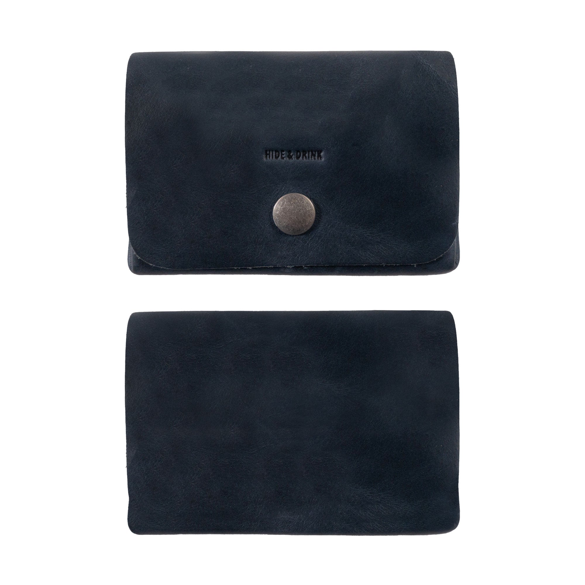 View of the gray Leather Double Pouch Card Wallet by Hide & Drink showing its stylish finish and closure. This Leather Double Pouch Card Wallet excels as a card organizer, cash holder, and ID case, perfect for both men and women. Handcrafted in La Antigua Guatemala & Oaxaca Mexico.