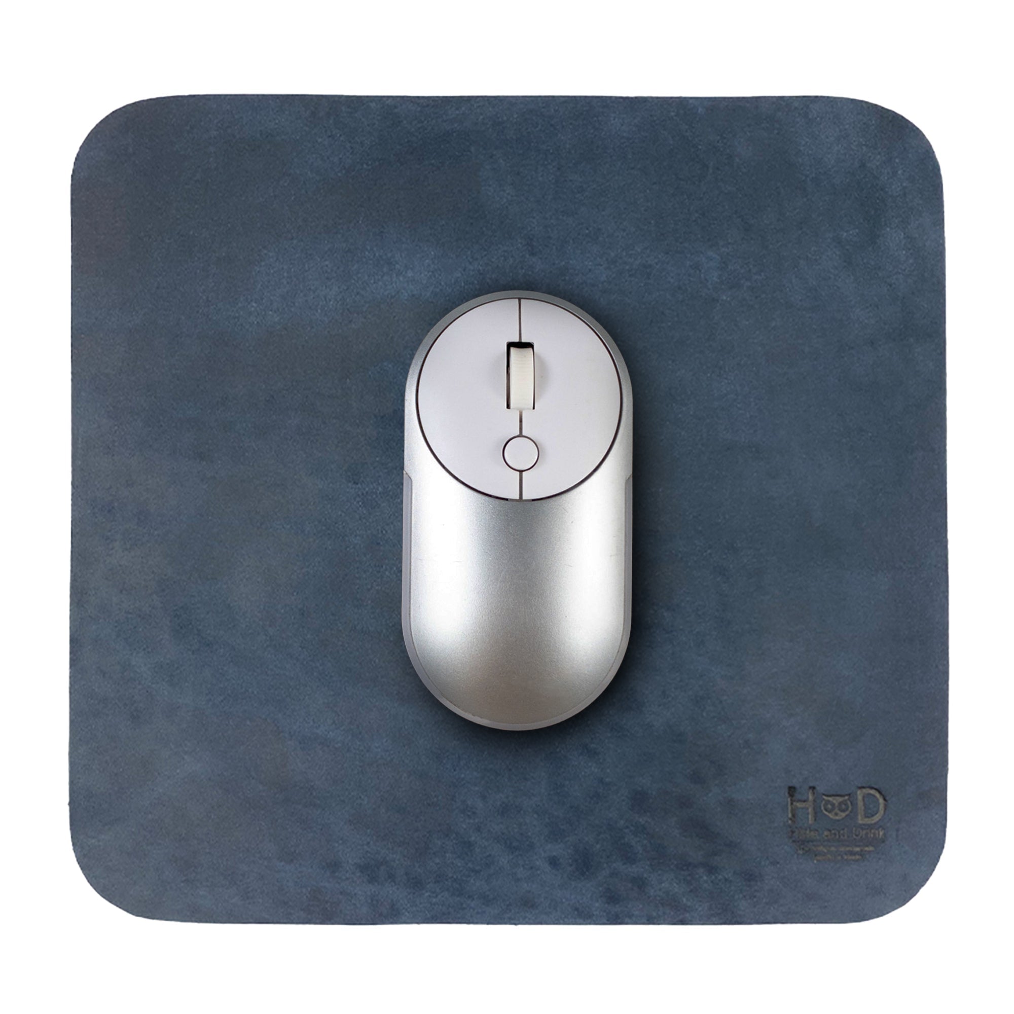 Hide & Drink Mousepad with a sleek dark blue design, great for enhancing your desk style. Its anti-slip leather surface is perfect for both Apple Magic Mouse & PCs, showcasing artisan craftsmanship from La Antigua Guatemala & Oaxaca Mexico.