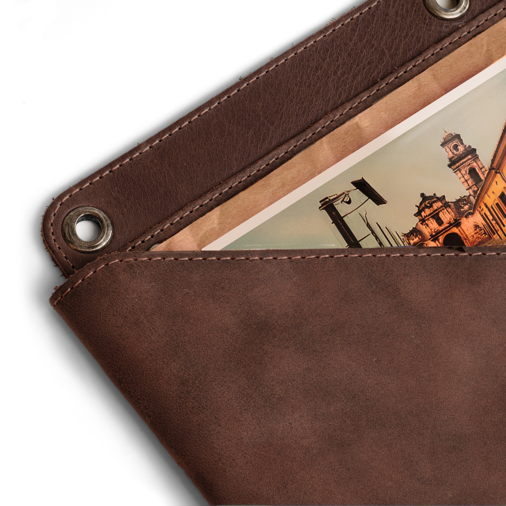 Close-up of the Wall File Organizer by Leather At Home, illustrating the detailed stitching and full grain leather texture. This Leather Wall Organizer for Office is an excellent Hanging Wall File Holder, perfect for organizing important documents and mail in style. Artisan crafted in La Antigua Guatemala & Oaxaca Mexico.