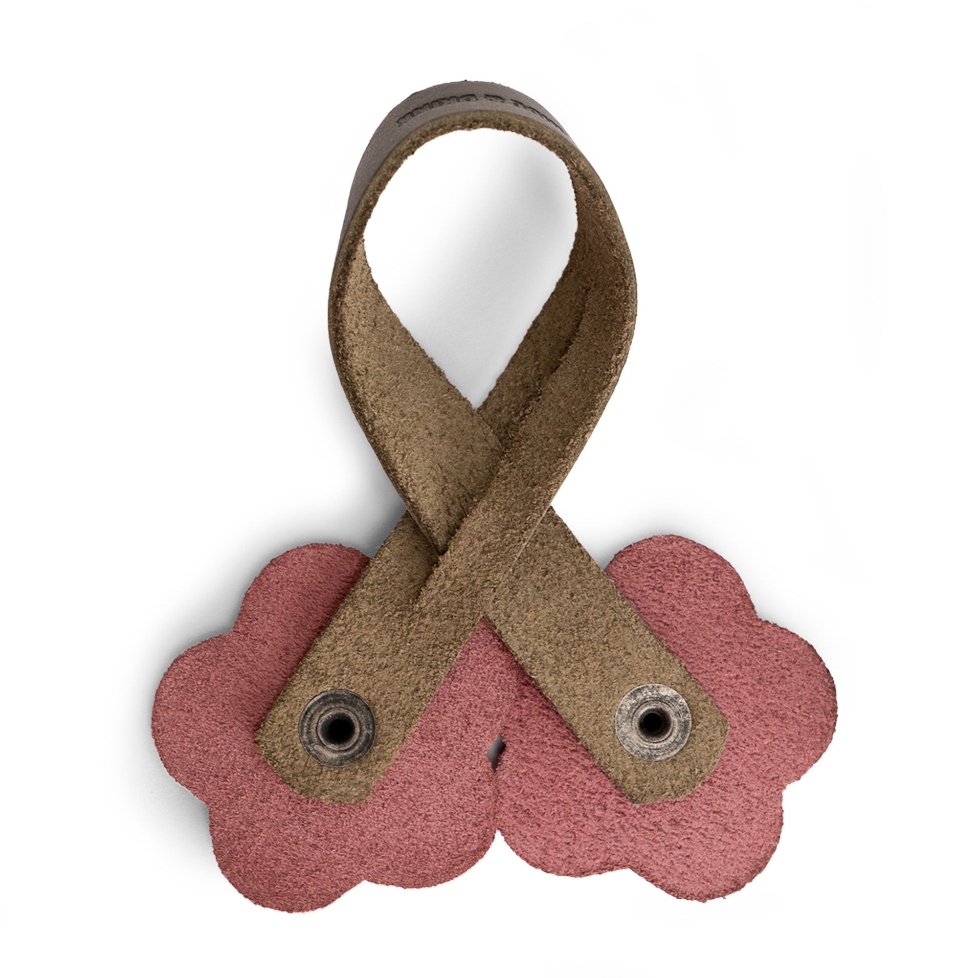 Unique view of the Rose Bag Ornament by Hide & Drink featuring light colors, highlighting the Full Grain Leather and flower design, a perfect handmade accessory that adds charm to bags and totes.
