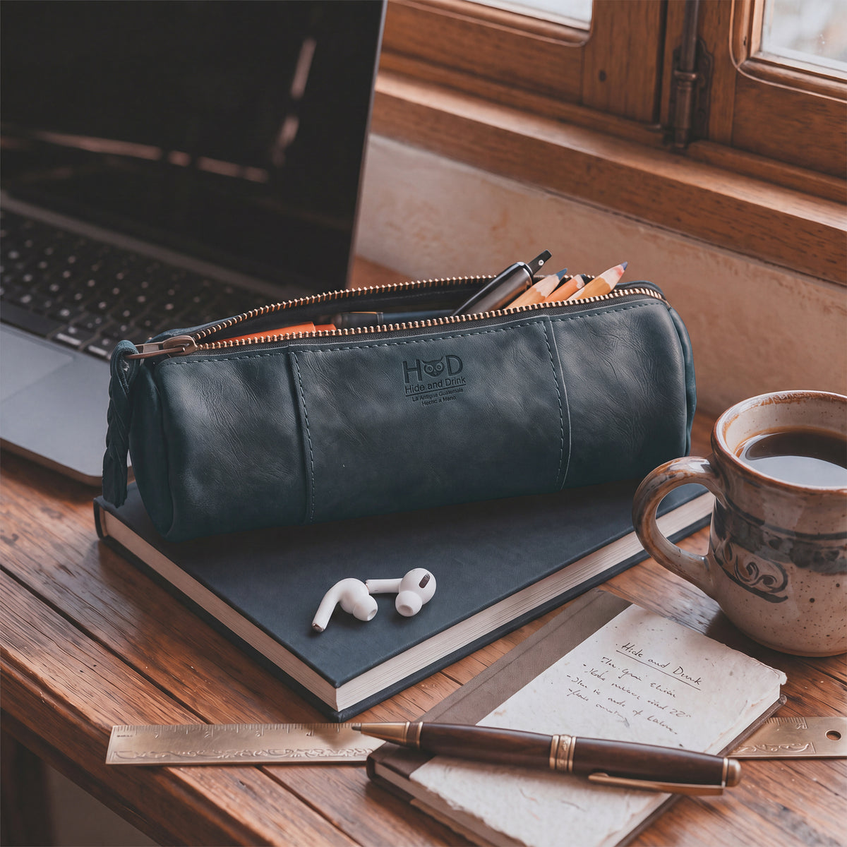 Utility Cylinder Case by Hide & Drink loaded with colorful pens, showcasing its practicality for daily use. This artisan-crafted bag is made from Full Grain Leather, ideal for personal items. Cylinder Case, Classic Bag, Handmade.