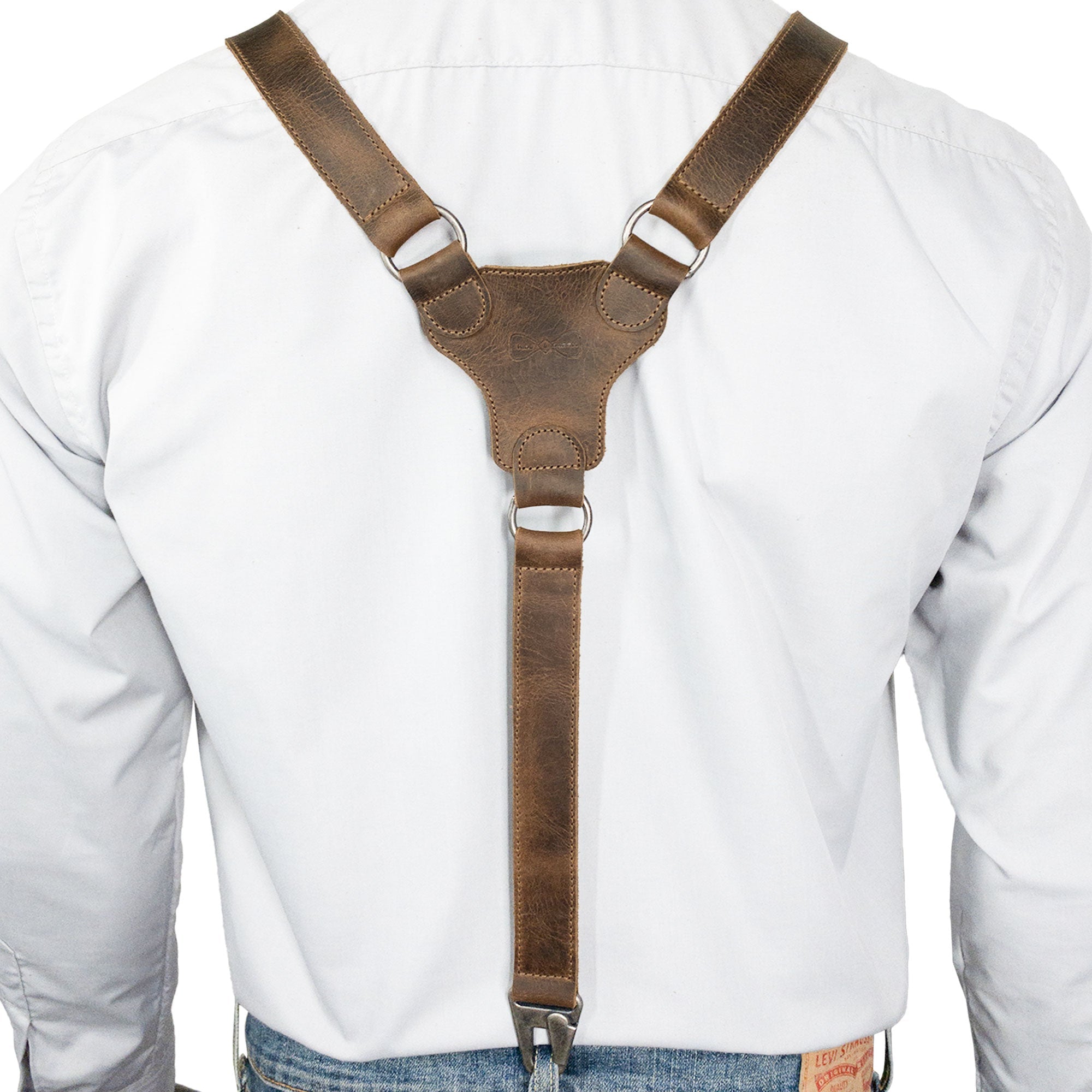 Back view of Hide & Groom's Leather Y Back Formal Suspenders, showcasing the detailed craftsmanship. These Full Grain Leather Y Back Formal Suspenders are not only a Steampunk Style choice but also a durable and refined Groom Accessory, handmade with care in La Antigua Guatemala.