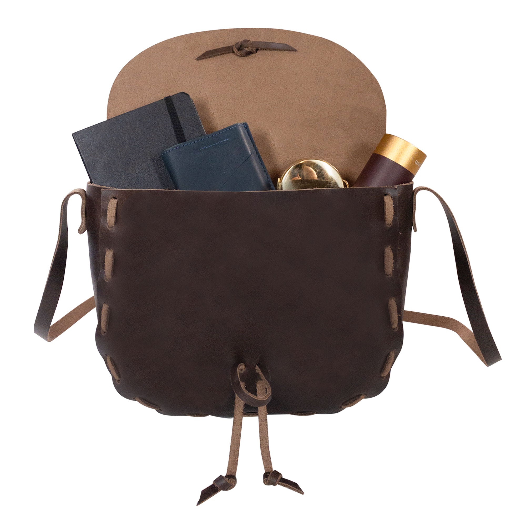 Medieval Style Shoulder Bag from La Antigua opened to display its spacious interior. Ideal as a travel bag, it combines stylish vintage design with functionality. Made from Full Grain Leather, this handmade artisan item is a product of small batch production, featuring hand cut and hand sewn elements, crafted in La Antigua Guatemala & Oaxaca Mexico.