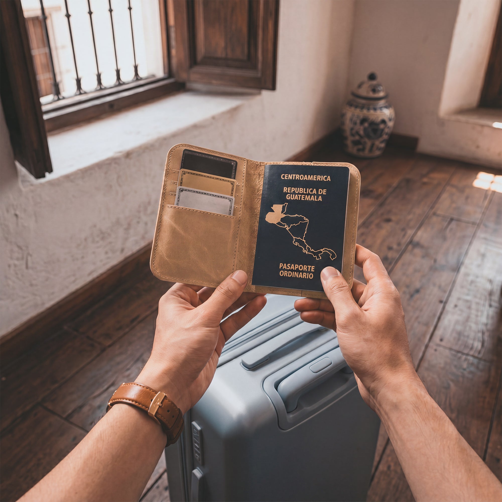Open view of the Hide & Drink Travel Wallet with space for cash and documents. This leather travel wallet serves as a practical bifold passport case and card holder, lovingly made in La Antigua Guatemala.