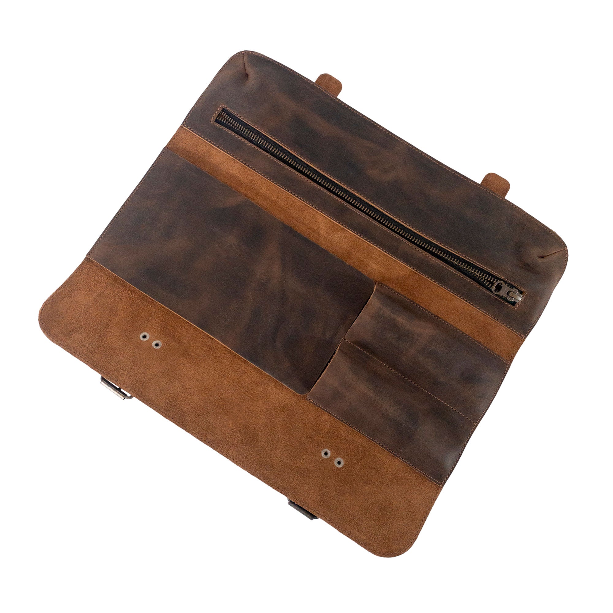 Back view of the Utility Knife Roll by Cast Leather Co., featuring a robust design for knives and cooking accessories. This rectangular roll for cutting essentials is crafted from full grain leather, emphasizing the small batch production techniques and artisan craftsmanship of La Antigua Guatemala.