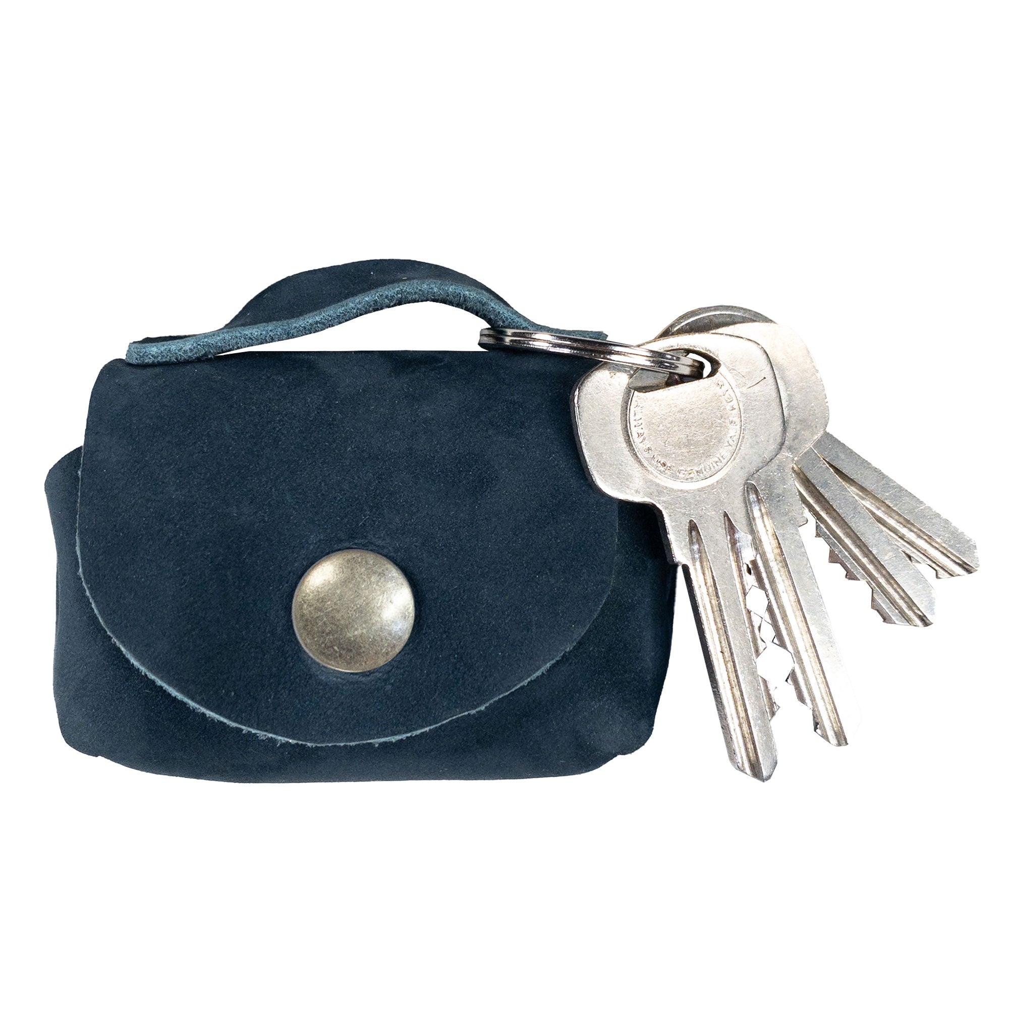 Tiny Handbag Keychain by Hide & Drink shown with keys attached, illustrating the practicality of this Tiny Handbag with Key Ring Holder made from Full Grain Leather. This artisan piece is a result of small batch production, meticulously hand cut, hand sewn, fire branded, and proudly handmade in La Antigua Guatemala & Oaxaca Mexico.