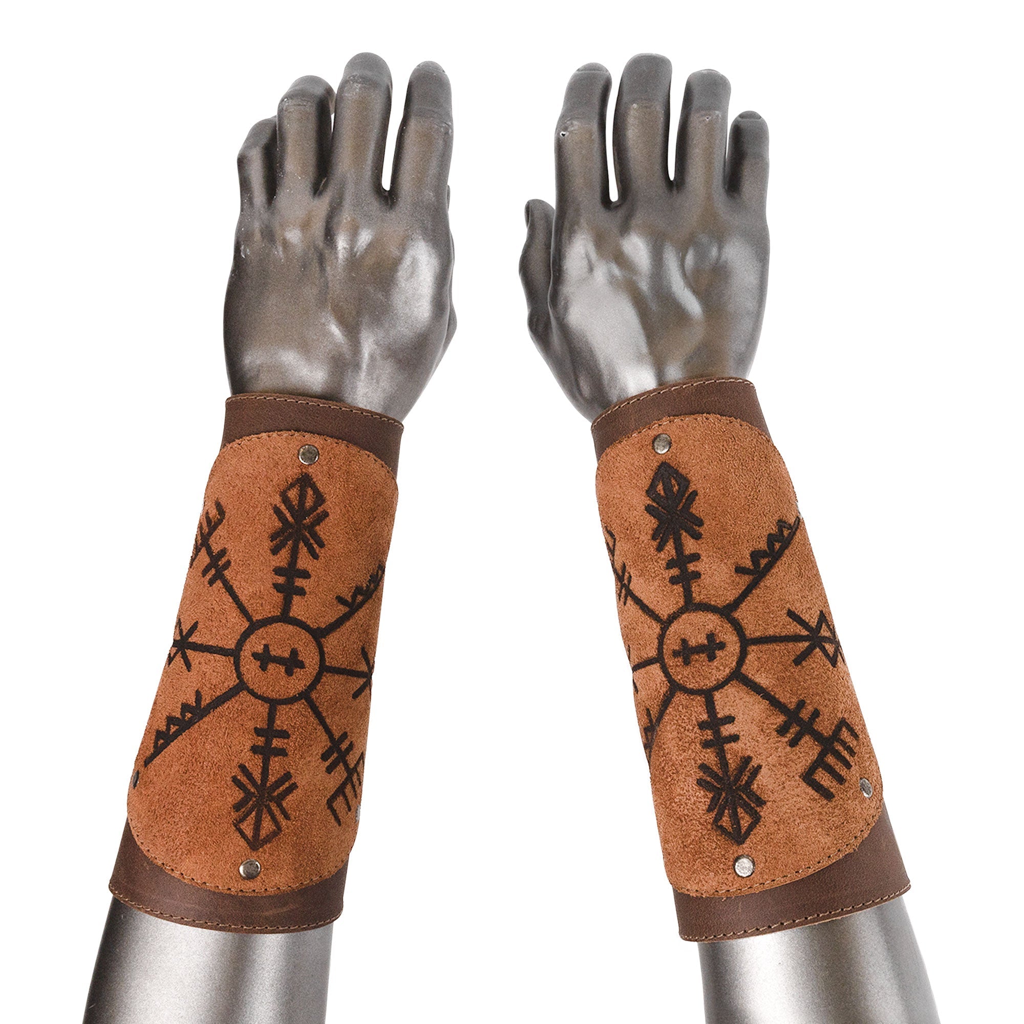 Close-up of Viking Bracers by Hide & Play on a mannequin, emphasizing the intricate detailing of this set of 2 Viking Style Bracers. These arm protectors for costume are made from durable full grain leather and exemplify small batch production, hand cut and hand sewn in La Antigua Guatemala & Oaxaca Mexico.