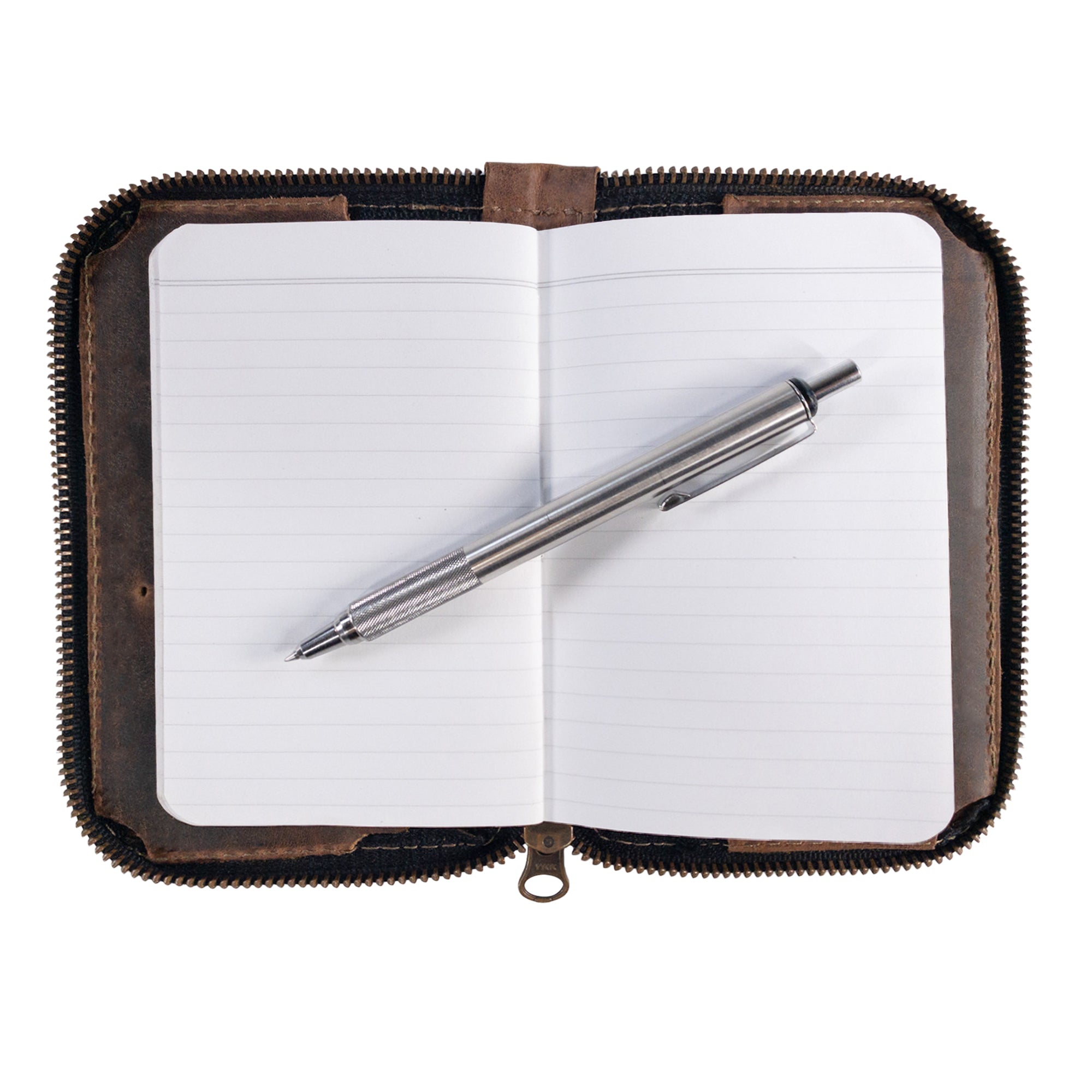 Hide & Drink's Zippered Journal Cover for Moleskine (Notebook NOT Included) with a pen placed on an open page, demonstrating its functionality. Artisan crafted from full grain leather in La Antigua Guatemala.