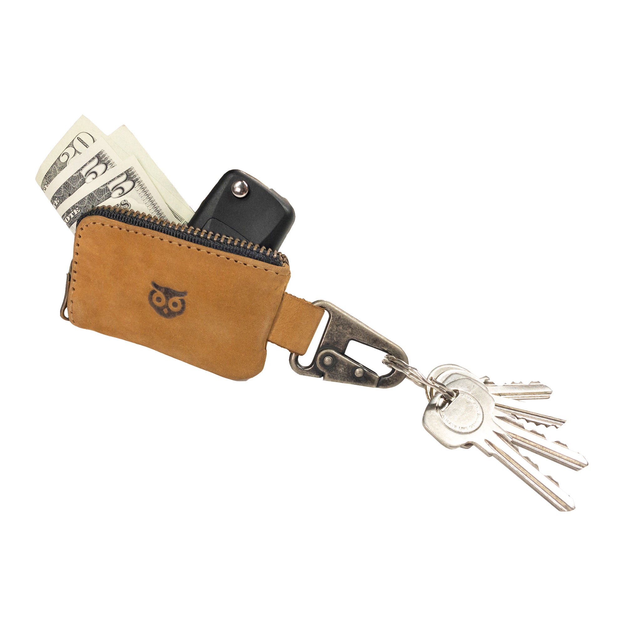 A practical use of the Hide & Drink Car Key Holder, displaying keys and cash. Ideal for organizing headphone cables, memory cards, and flash drives, this artisan piece is handcrafted in La Antigua Guatemala & Oaxaca Mexico.
