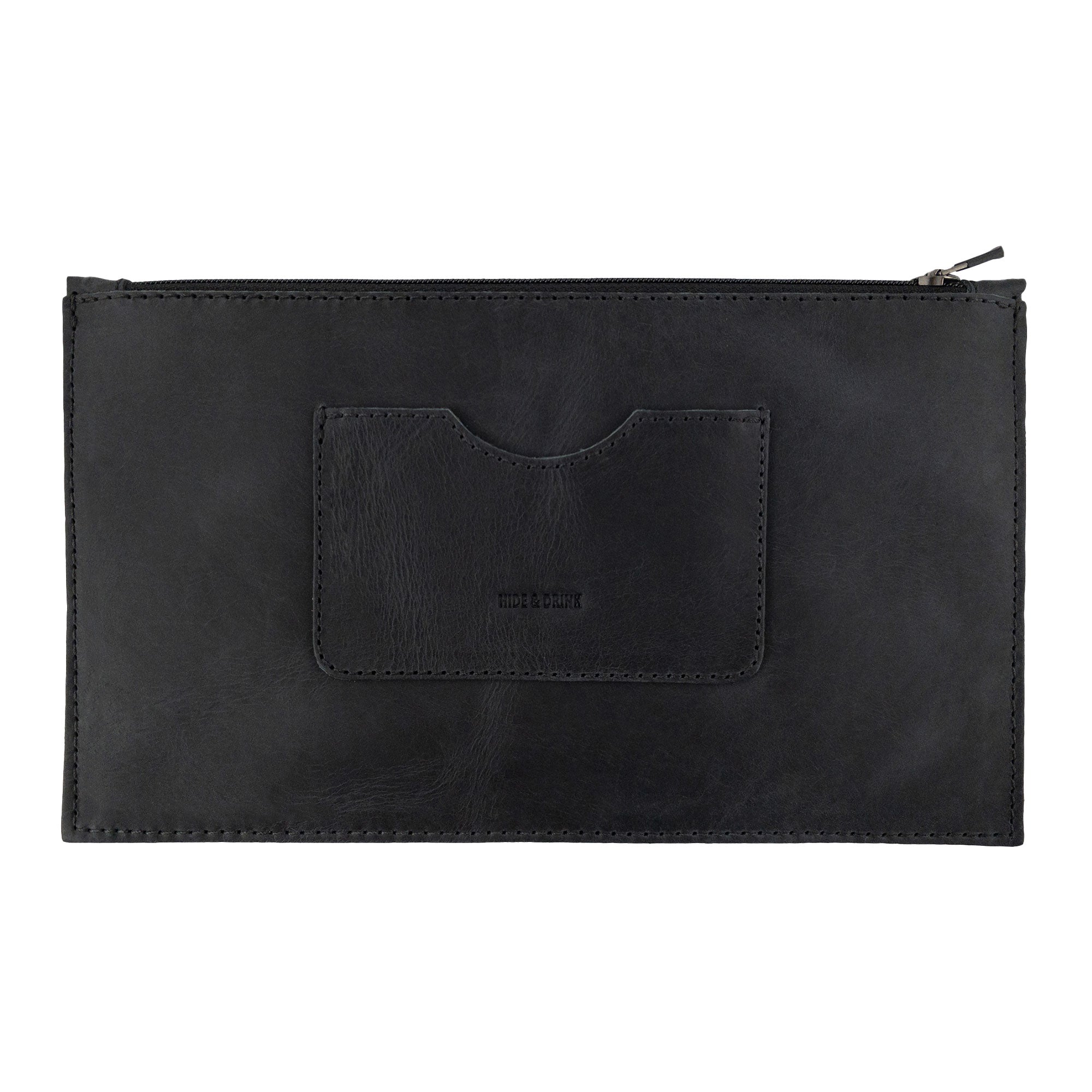 A frontal view of a black rectangular zippered handbag by Hide & Drink, showcasing its sophisticated design. This female purse includes a card slot, made from high-quality full grain leather, reflecting small batch production and artisan craftsmanship. Handmade in La Antigua Guatemala & Oaxaca Mexico.