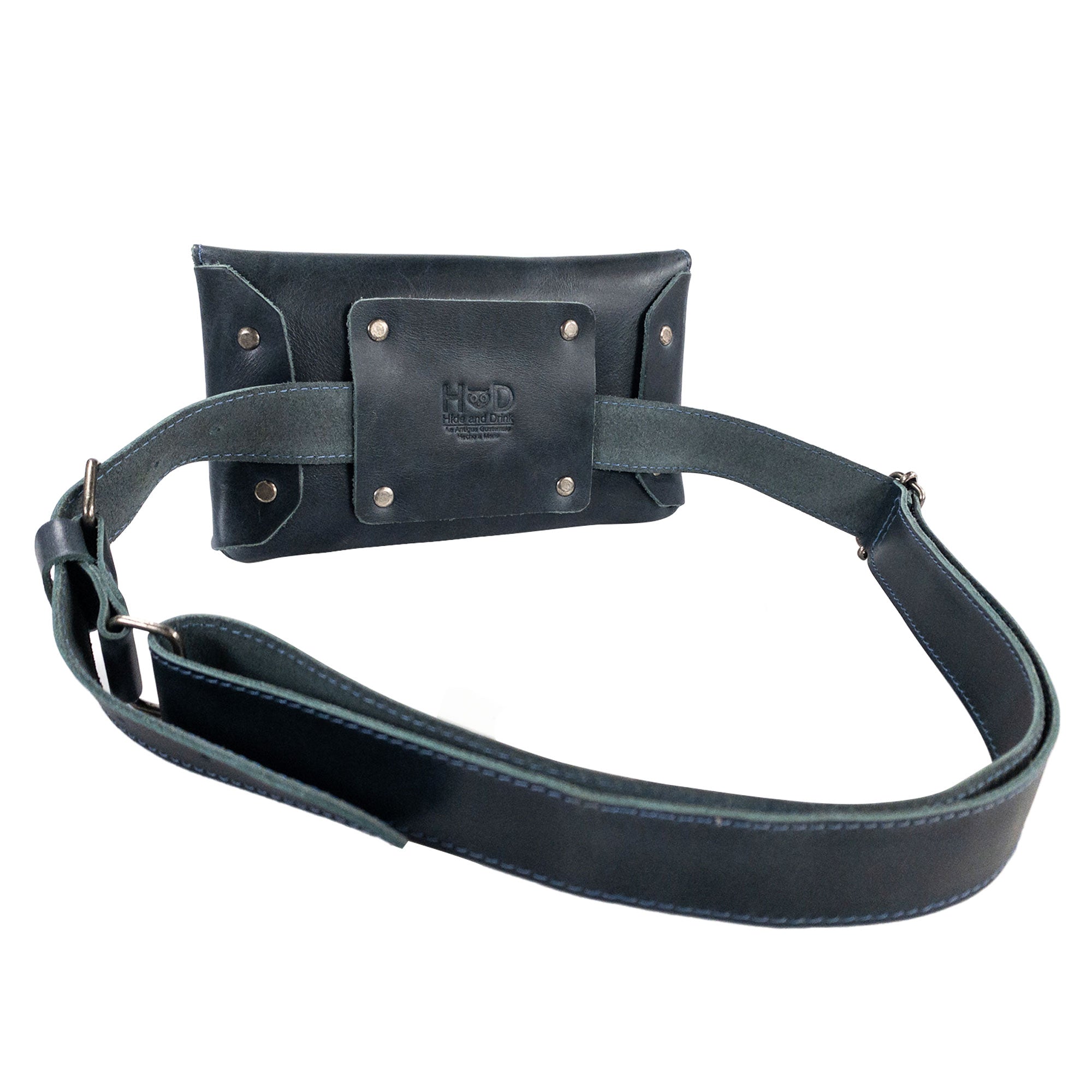 Hide & Drink’s glossy black Fancy Fanny Pack demonstrating superior craftsmanship. This full grain leather waist pouch is perfect for multitasking as both a medieval bag and stylish fanny pack.