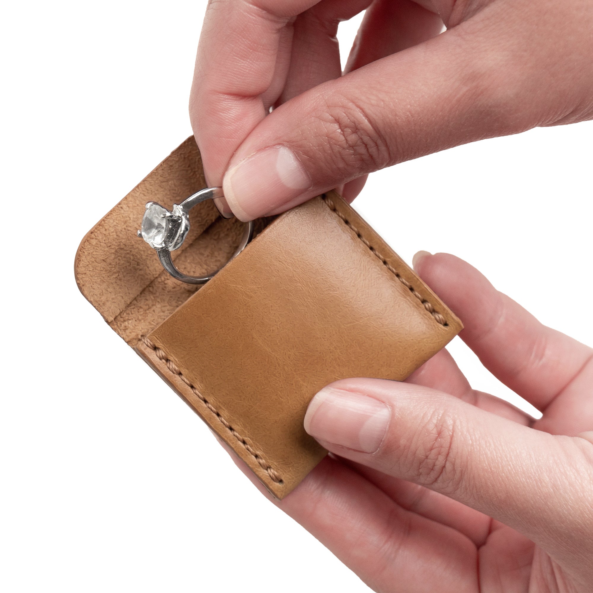 Beautifully crafted Hide & Drink Wedding Ring Case in soft full grain leather, providing an elegant way to store engagement rings. Ideal for travel and as a pouch organizer for jewelry, hand stitched with attention to detail by artisans in La Antigua Guatemala & Oaxaca Mexico.
