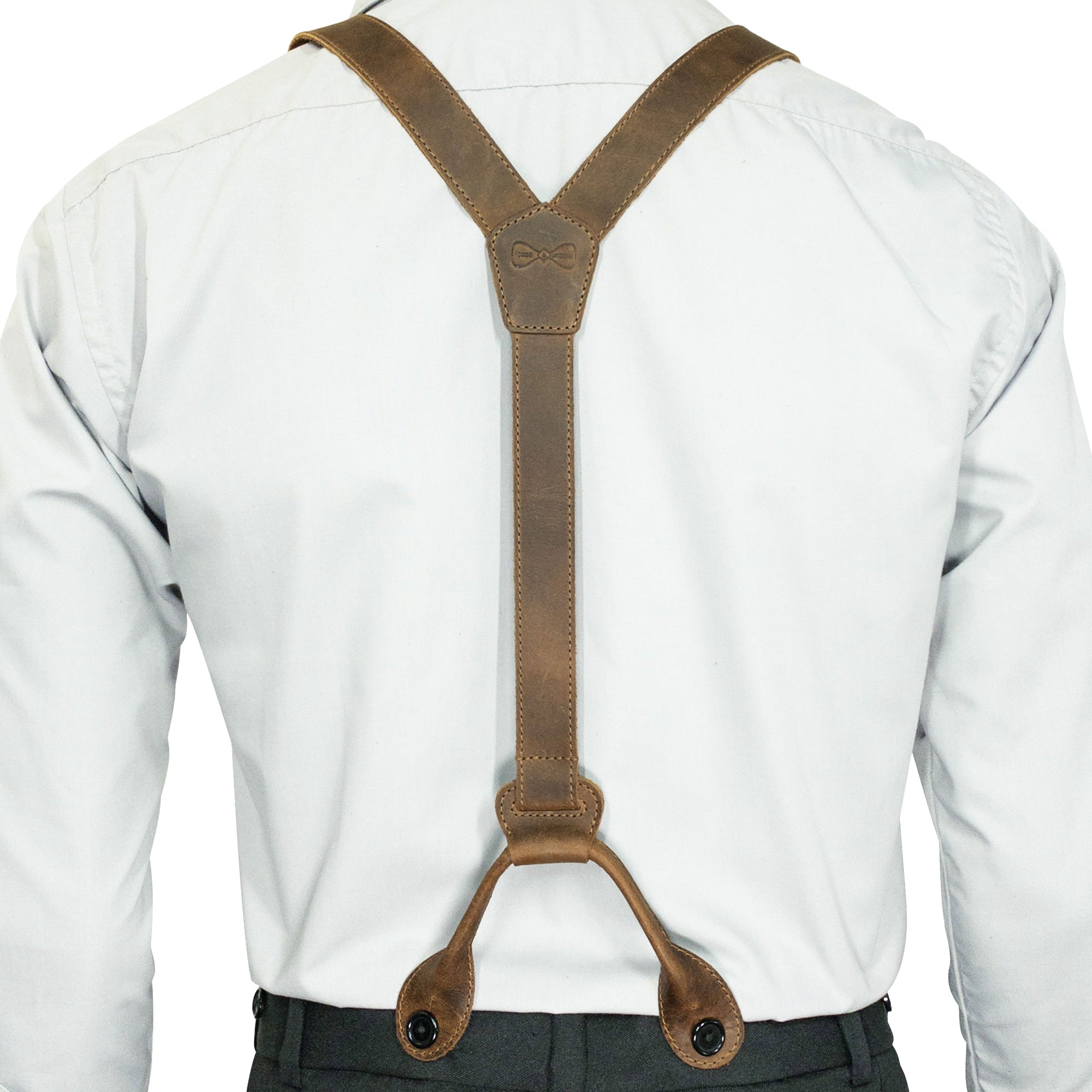 Rear view of Y Back Button End Suspenders by Hide & Groom, highlighting the adjustable straps and button ends. An essential for groomsmen, these suspenders made from full grain leather are designed for comfort and style, ideal for formal occasions. Each piece is hand sewn, fire branded, and crafted in La Antigua Guatemala.