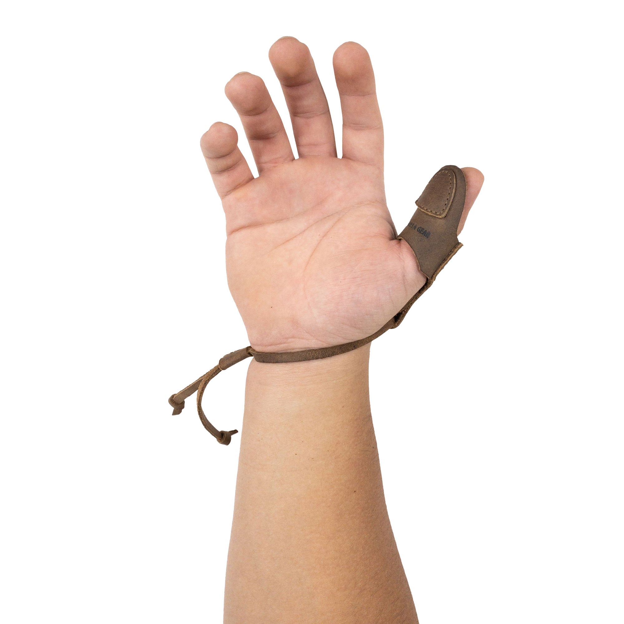 Another view of the Archery Thumb Finger Protector from Valhalla Gear, illustrating the unique handmade craftsmanship. This full grain leather accessory is designed for archery enthusiasts utilizing recurve bows while providing a secure fit for effective targeting.