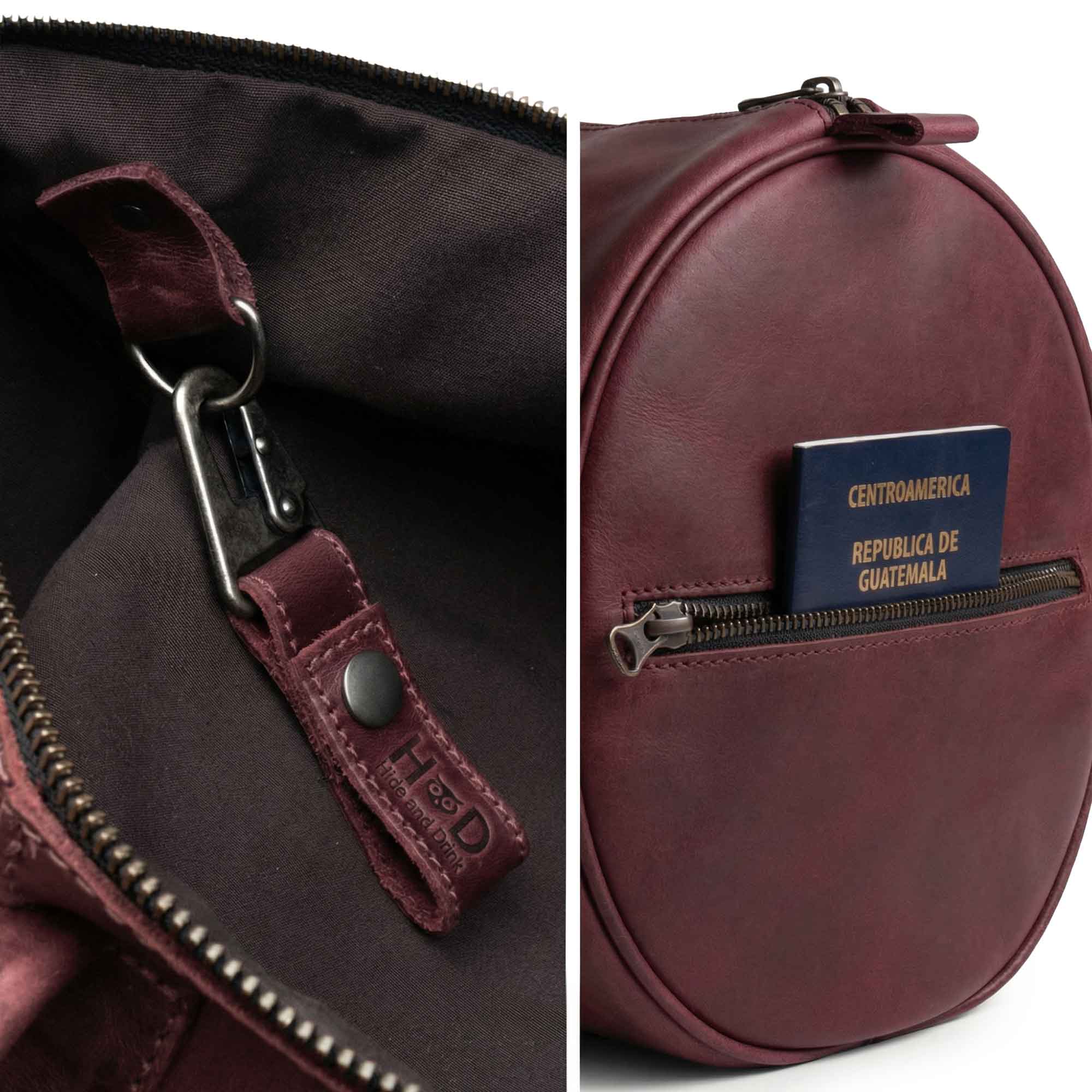 Classic Duffle Bag by Hide & Drink in vibrant pink, featuring a stylish design with a zipper closure and adjustable strap. The Full Grain Leather Classic Duffle Bag is perfect as a Messenger Bag for travel, handmade by artisans in La Antigua Guatemala & Oaxaca Mexico.