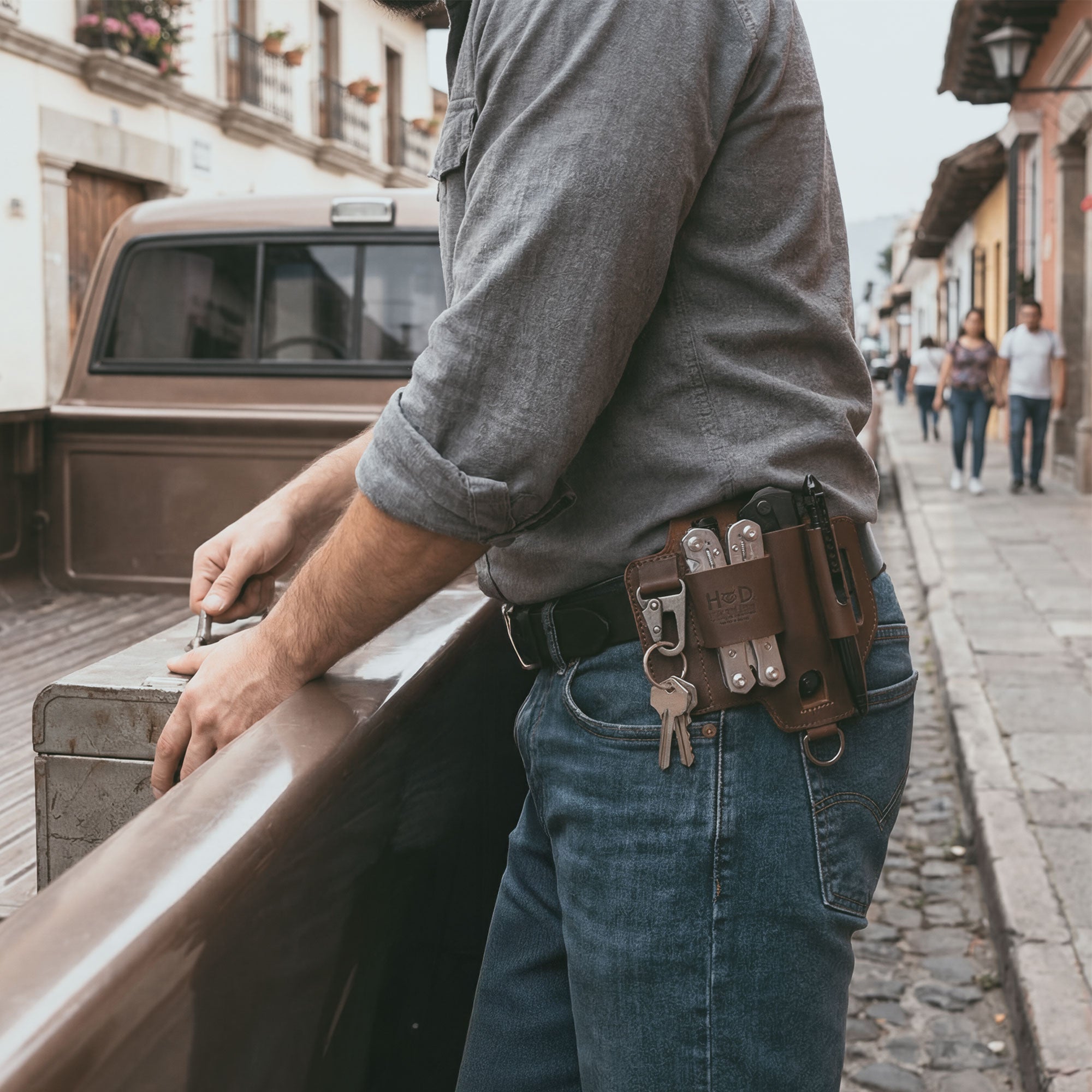Hide & Drink Multi-tool Sheath for Waist Belt worn on a belt outdoors: Leather Multi-Tool Sheath for Waist Belt, Holster with Belt Loop, Outdoor Case, EDC Organizer for Belts, Pocket Knife Sheath, Camping Accessory, Multitool Pouch in full grain leather, Handmade in La Antigua Guatemala & Oaxaca Mexico by StockyardX small batch production, hand cut and hand sewn with Fire Branded Artisan finish.