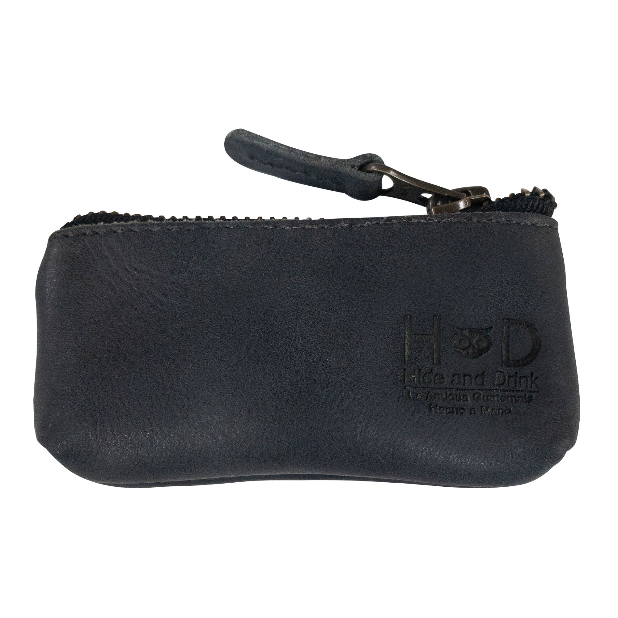 Hide & Drink Key Holder Zippered Pouch in a rustic brown hue, demonstrating vintage style craftsmanship. Ideal for keys, coins, or small memory cards, handmade in La Antigua Guatemala & Oaxaca Mexico.