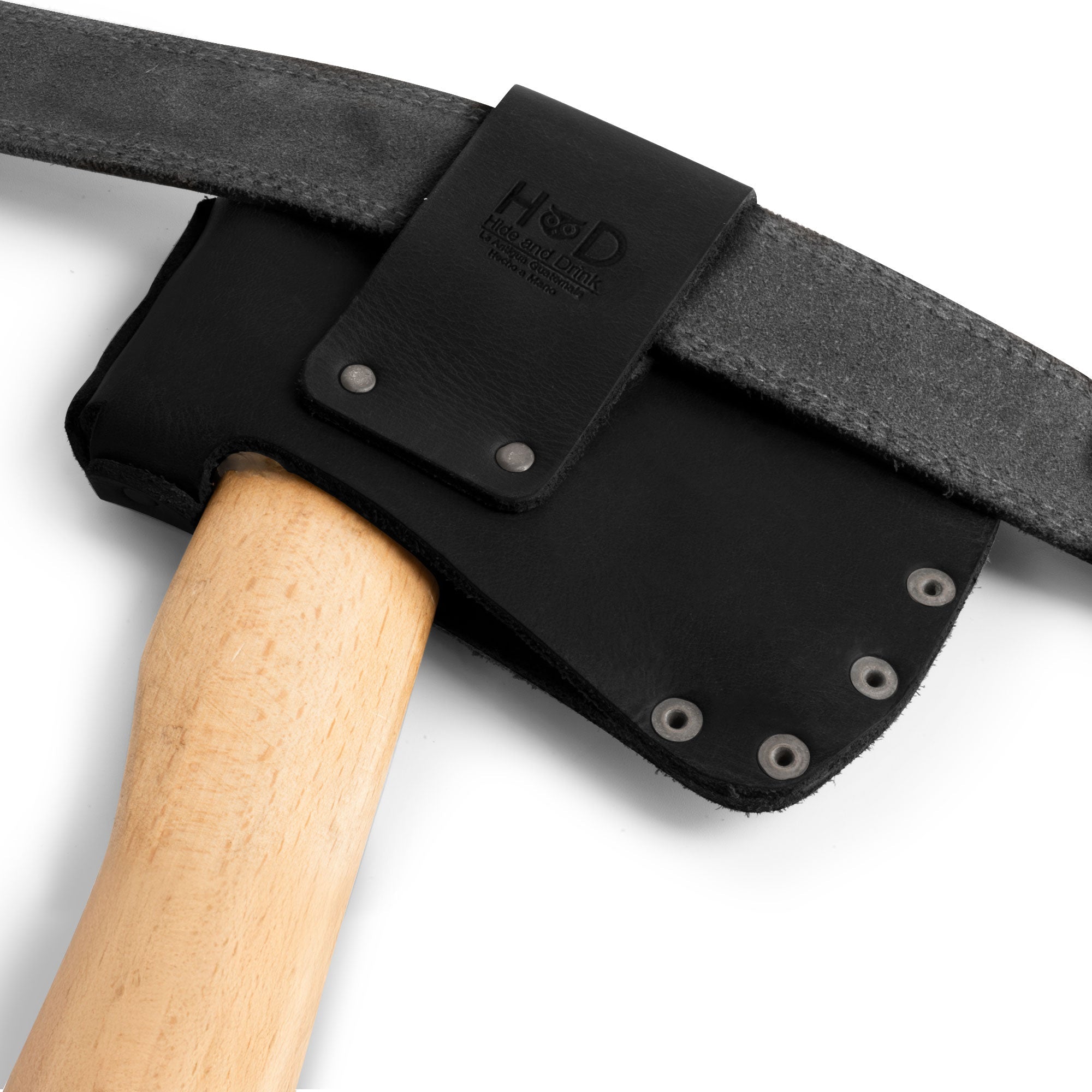 Hide & Drink Hatchet Head Sheath in black leather featured in creating the ultimate holster for 1.5 in. belts. This blade cover serves as an axe head case perfect for lumberjack work essentials, lovingly handmade in La Antigua Guatemala & Oaxaca Mexico.