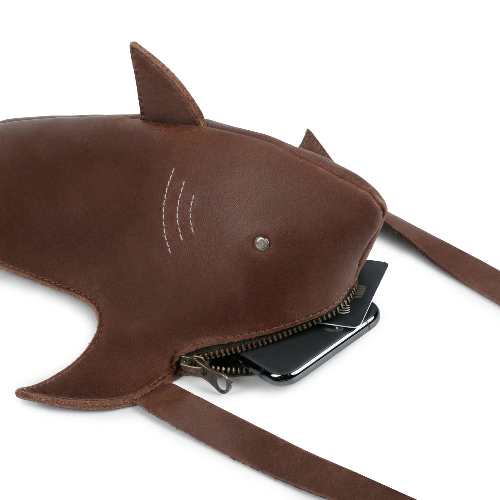 Practical Shark-Shaped Shoulder Bag by Tudi Frudi, showcasing its spacious interior, made of Full Grain Leather, featuring an adjustable strap for customizable comfort, embodying artisan craftsmanship with a fire branded logo from Handmade in La Antigua Guatemala.