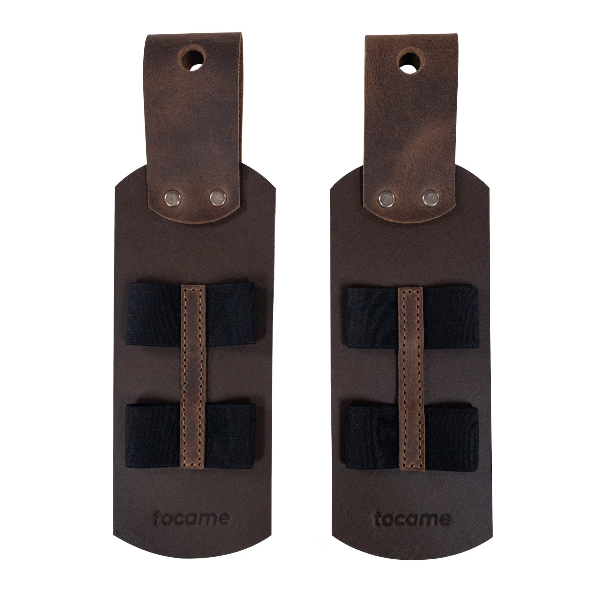 An overhead view of the rustic Set of 2 Drum Stick Sleeves by tocame, displaying the elegant design with elastic straps for secure stick holding. Made from high-quality full grain leather, this stick case epitomizes handmade craftsmanship from artisan producers in La Antigua, Guatemala.