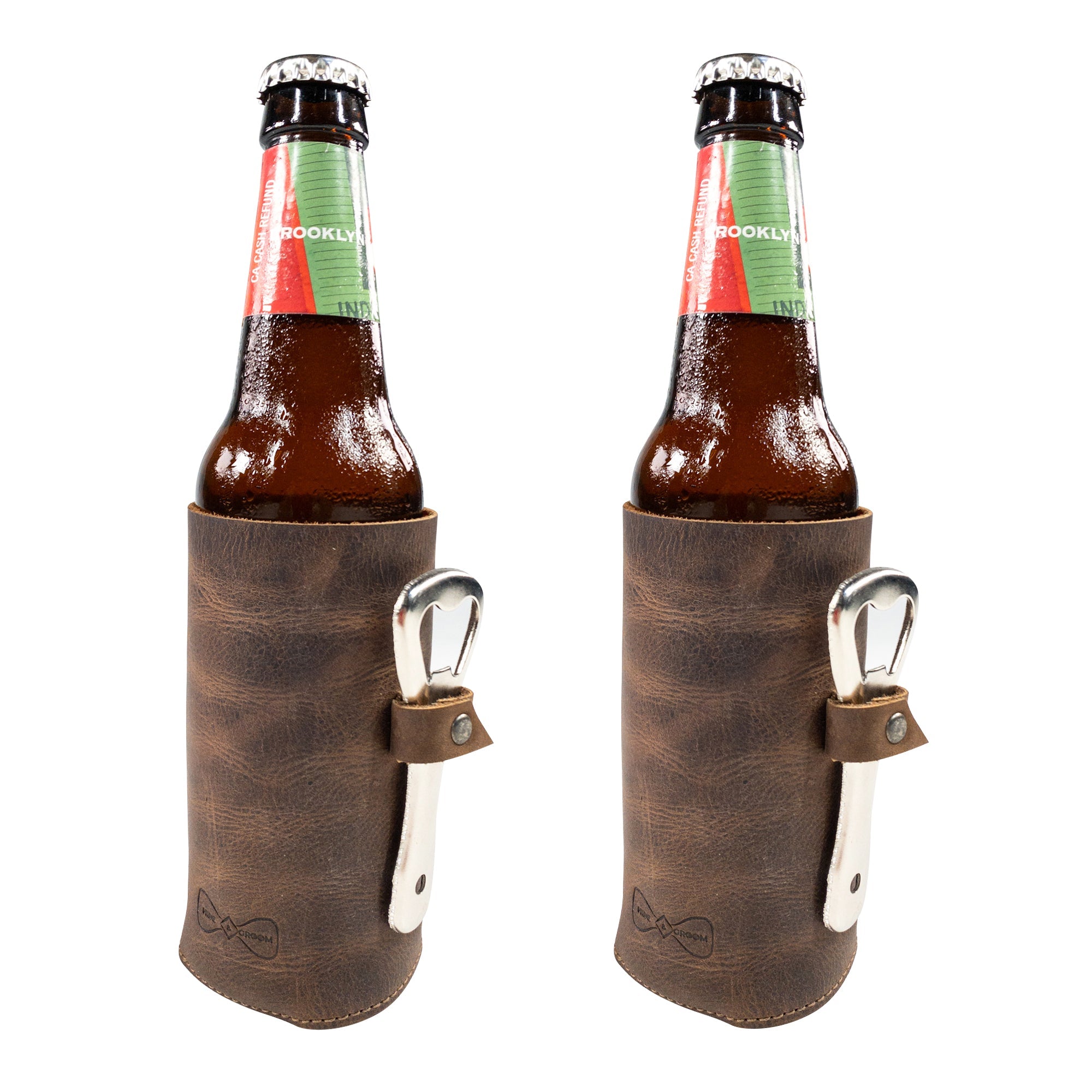 Hide & Groom Beer Bottle Sleeve Set of 2 displayed on chilled bottles, featuring bottle opener slots. These collapsible full grain leather sleeves are perfect for weddings and events, showcasing small batch production in La Antigua Guatemala.
