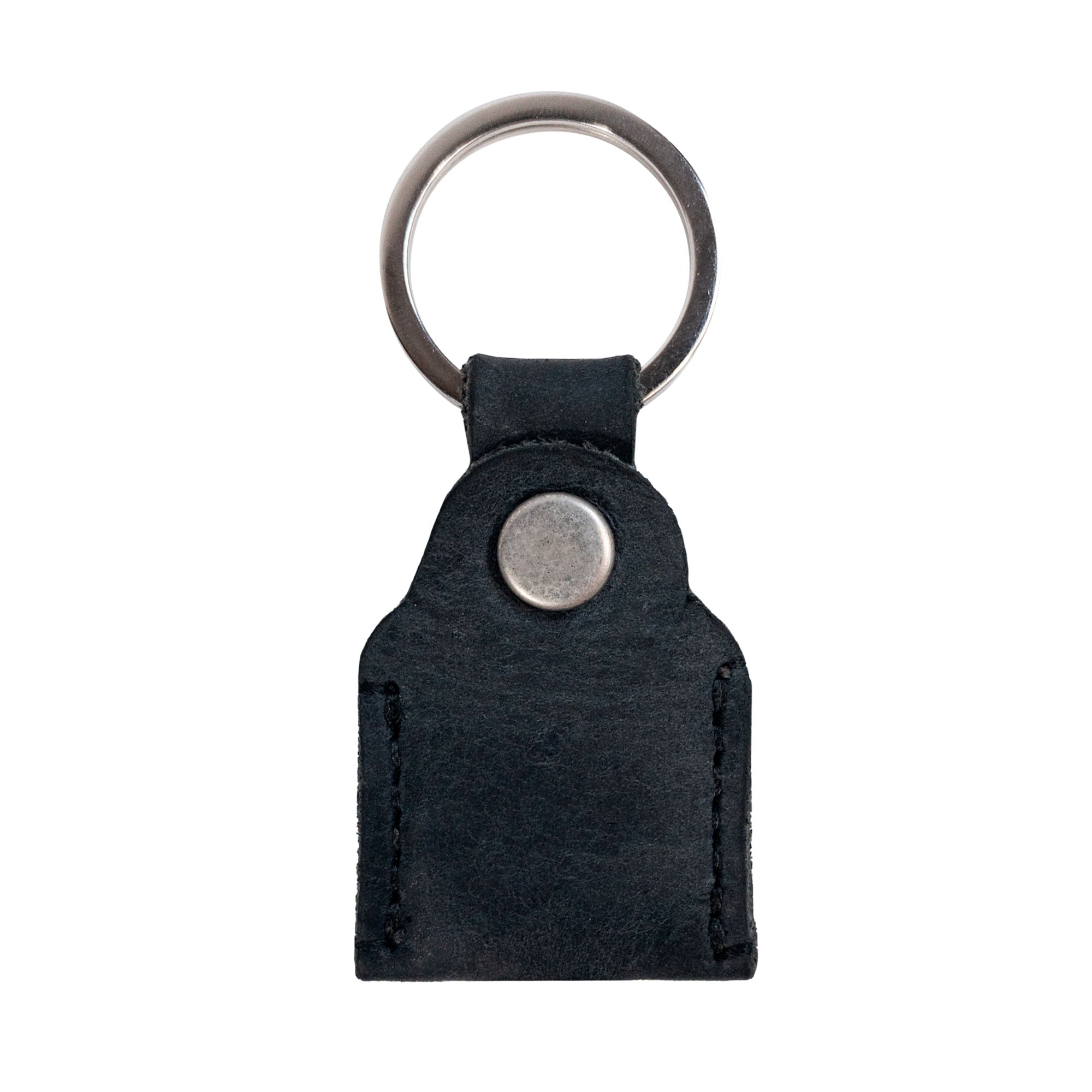 Hide & Drink Key Holder in black leather, expertly designed to hold your keys safely. This stylish Key Holder is perfect for use as a Keychain Organizer and emergency coin pouch, a must-have for any pocket accessory collection. Handmade in La Antigua Guatemala & Oaxaca Mexico showcasing artisan craftsmanship.