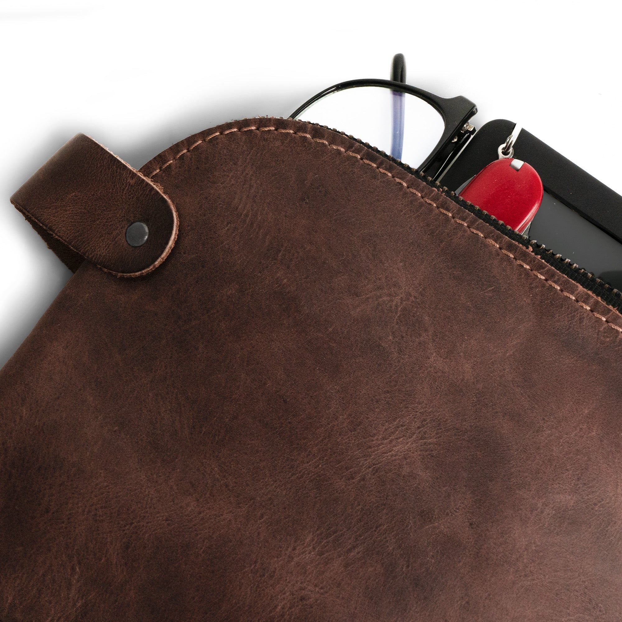 Dopp Kit Utility Bag by Hide & Drink showcasing its rich texture and artisanal craftsmanship. This large rustic all-purpose Dopp Kit Utility Bag is crafted from full grain leather, ideal for travel and multi-purpose use, handmade in La Antigua Guatemala & Oaxaca Mexico.