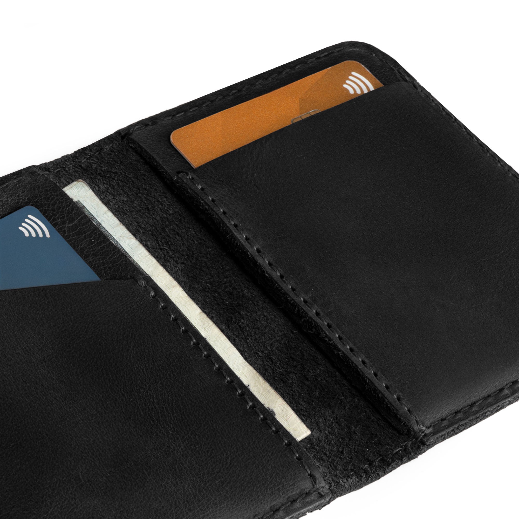 Detail shot of the Hide & Drink Bifold Wallet’s card slots, exemplifying handmade quality from La Antigua Guatemala and perfect for practical everyday use.