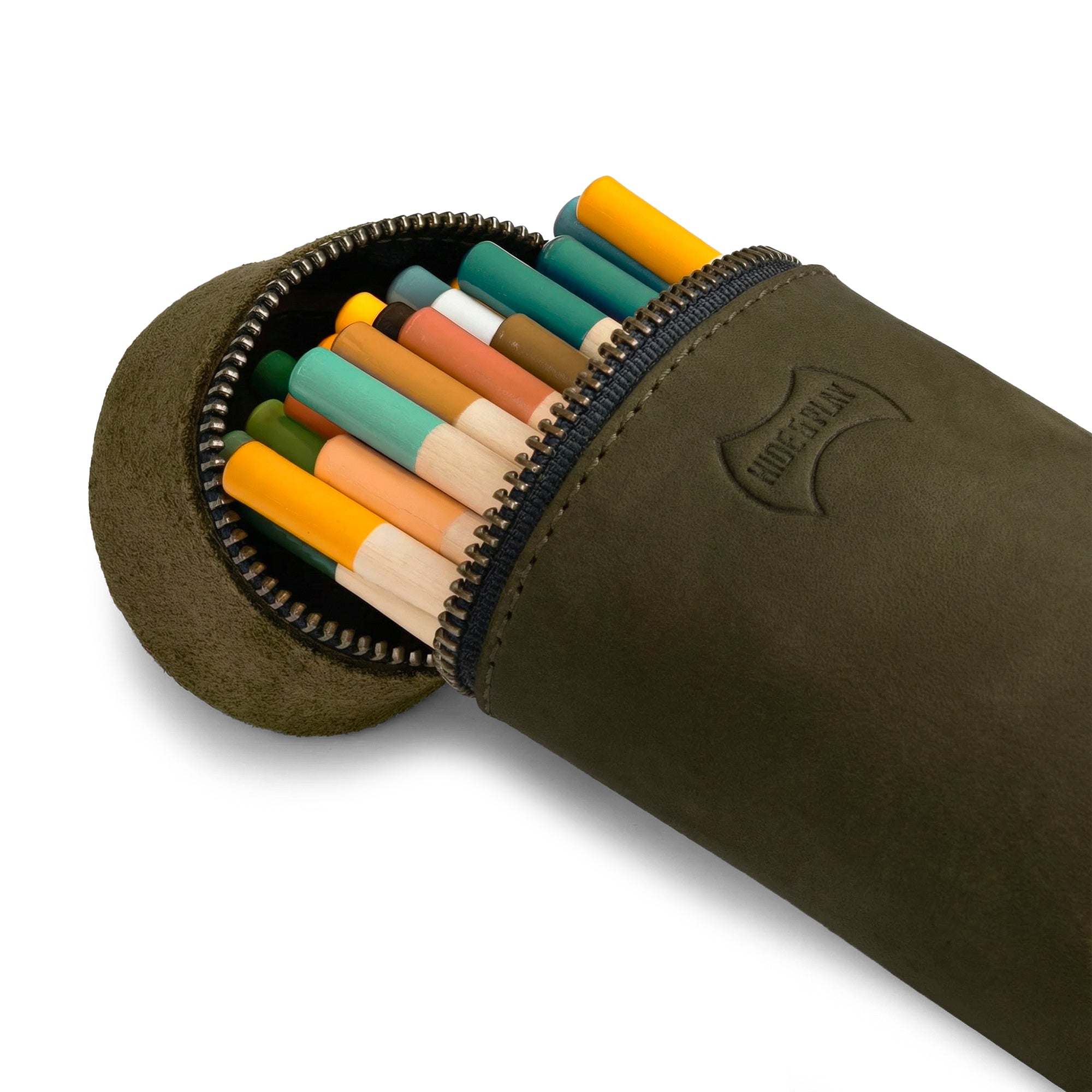 Close-up of the zipper of the Hide & Play Pencil-Shaped Case, demonstrating its stylish design for storing pens, pencils, markers, and office accessories. Made from full grain leather, this bag embodies handmade quality and is a great example of small batch production, crafted in La Antigua Guatemala & Oaxaca Mexico.