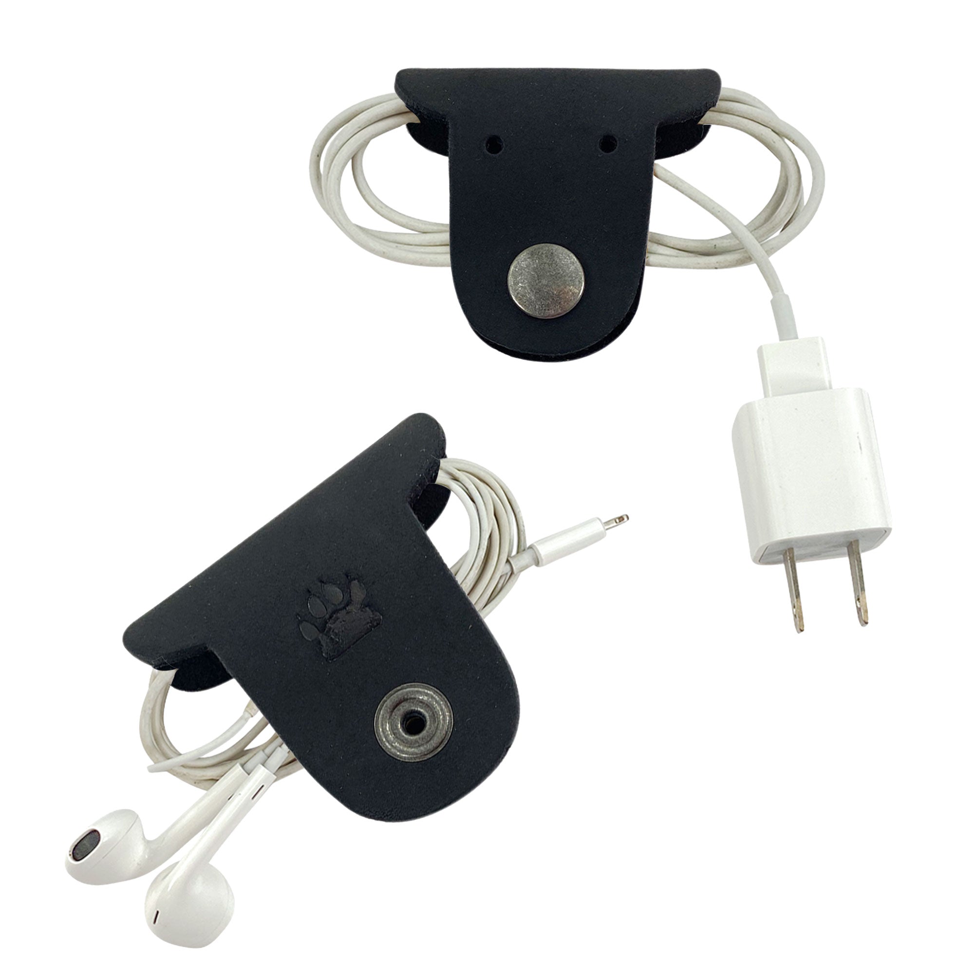 Keep your cords neat with Taco Dog's Dog Cord Keepers, featuring a unique design to manage headphones and chargers. Made from full grain leather, these handmade pieces offer both function and style for travel. Enjoy artisanal craftsmanship from La Antigua Guatemala with this 2 pack.