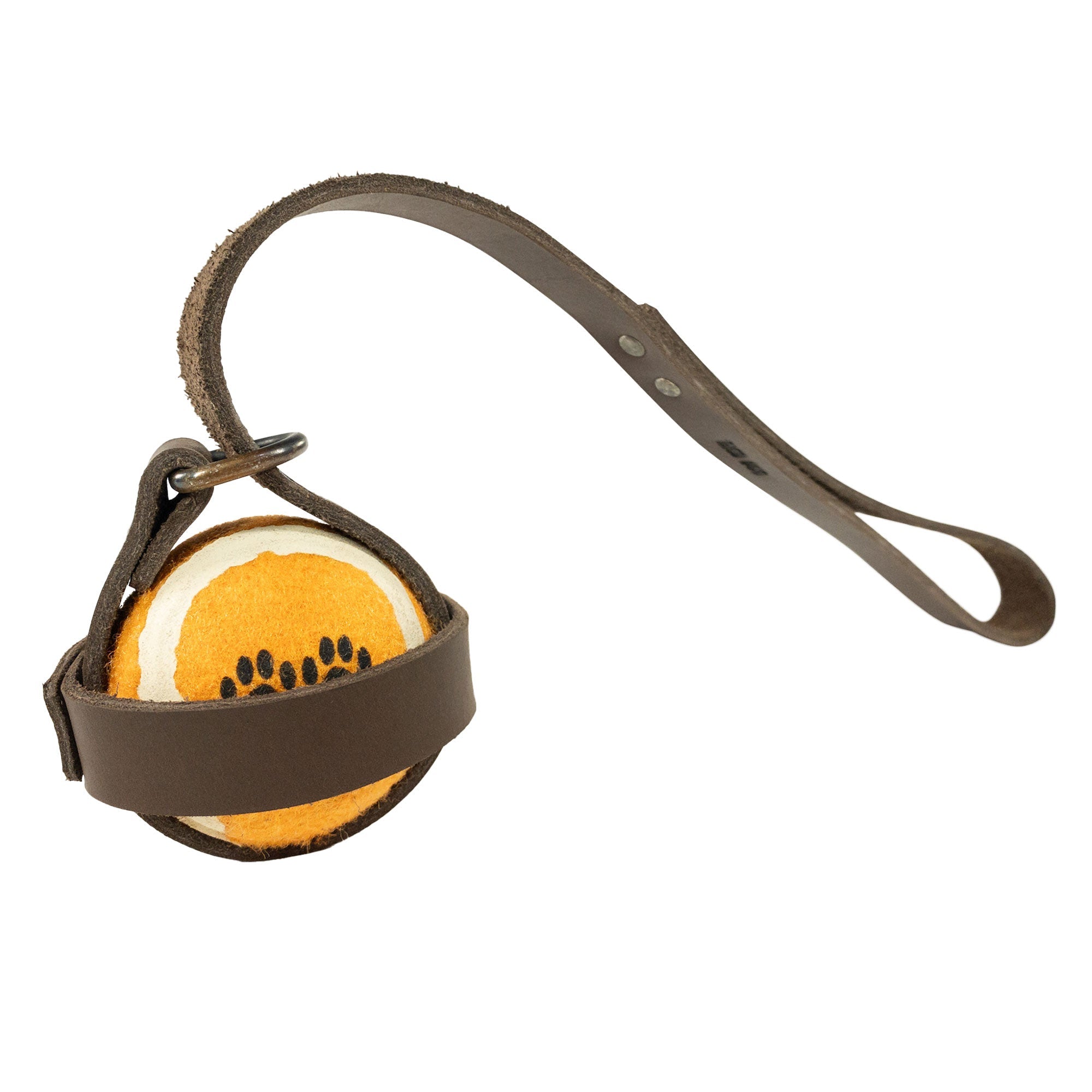 Close-up of the Dog Ball Holder by Taco Dog, crafted from full grain leather and designed for better pet play, reinforces the hands-free accessory concept for dog ball toys. Each holder is meticulously hand cut, hand sewn, and fire branded, depicting the outstanding artisan production from La Antigua Guatemala.